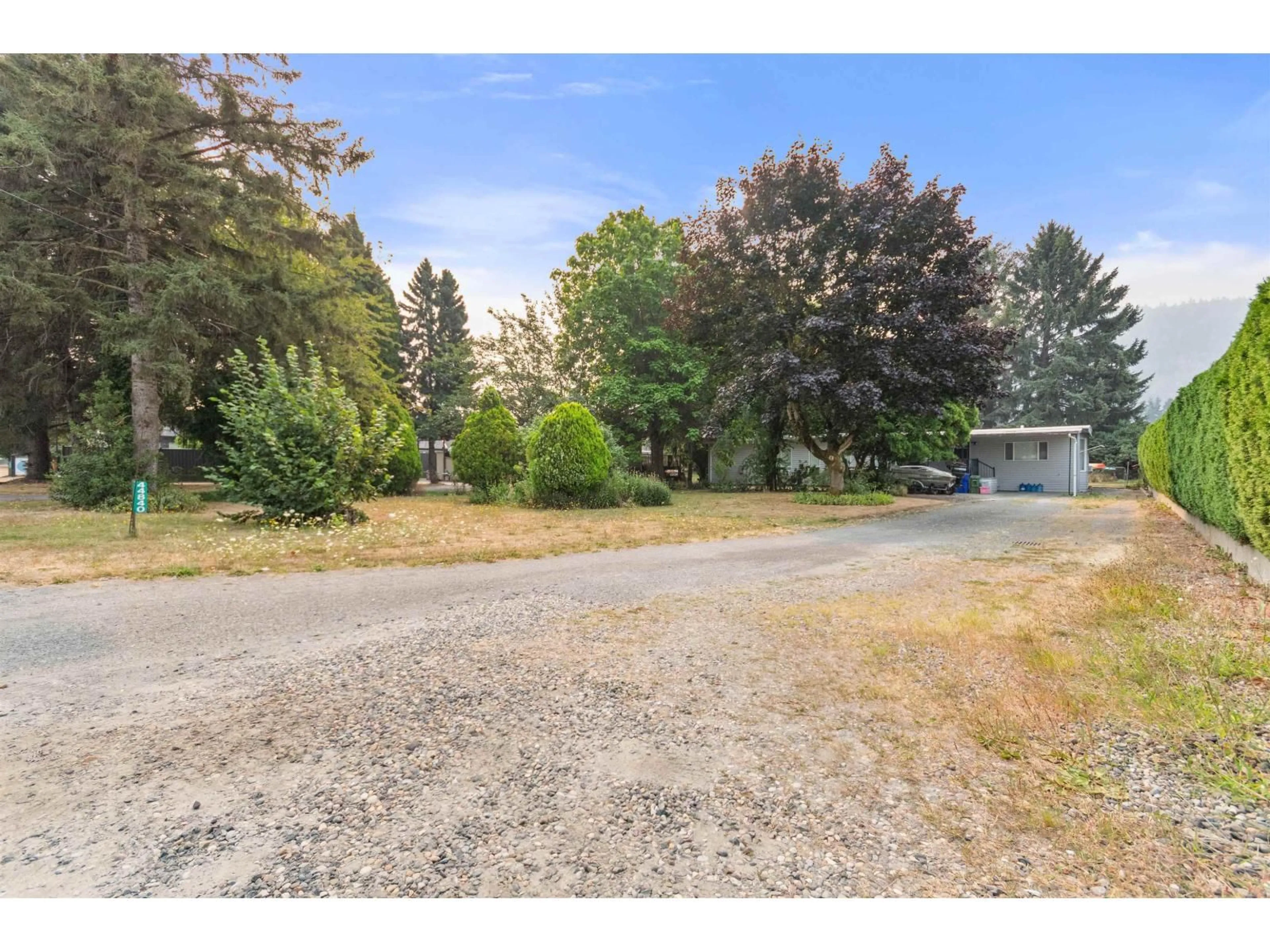 A pic from outside/outdoor area/front of a property/back of a property/a pic from drone, street for 44840 KEITH WILSON ROAD, Chilliwack British Columbia V2R3J9