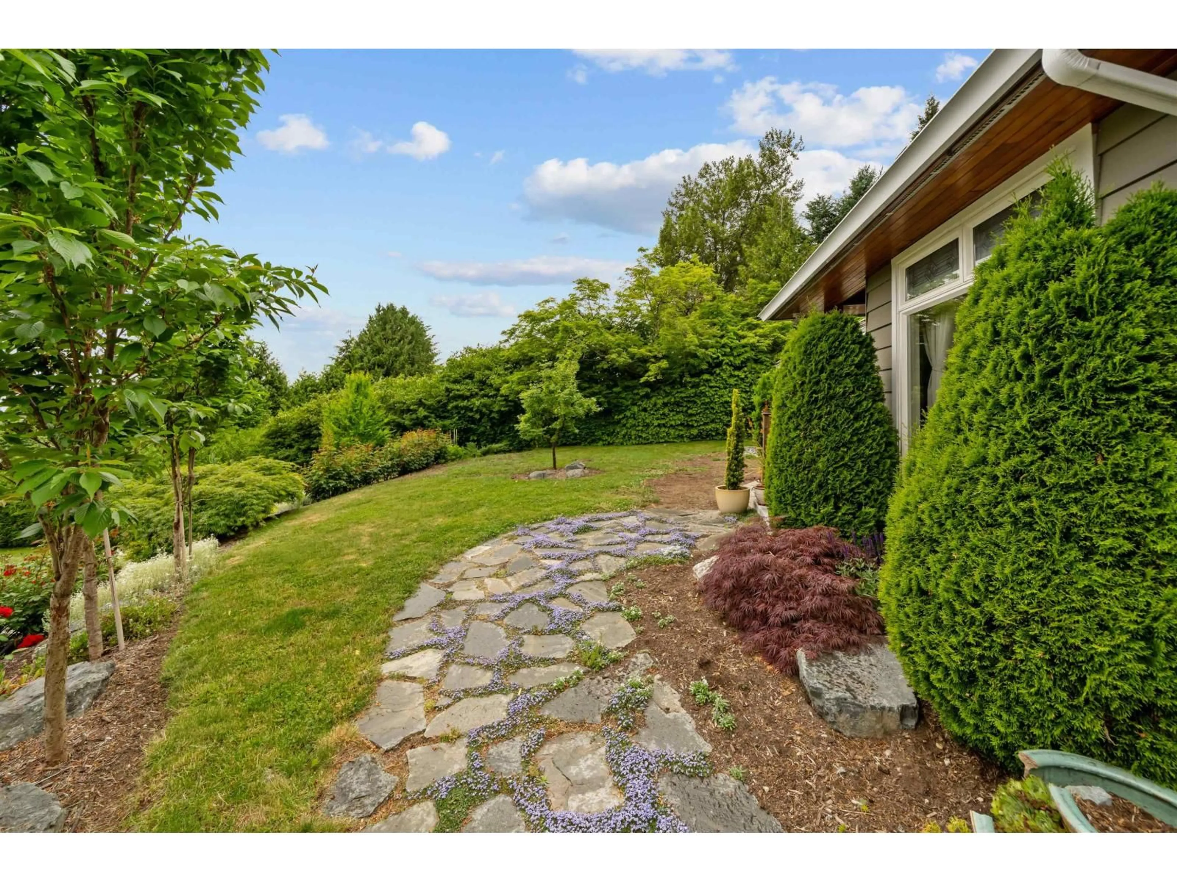 A pic from outside/outdoor area/front of a property/back of a property/a pic from drone, water/lake/river/ocean view for 8054 SYKES STREET, Mission British Columbia V2V3W2