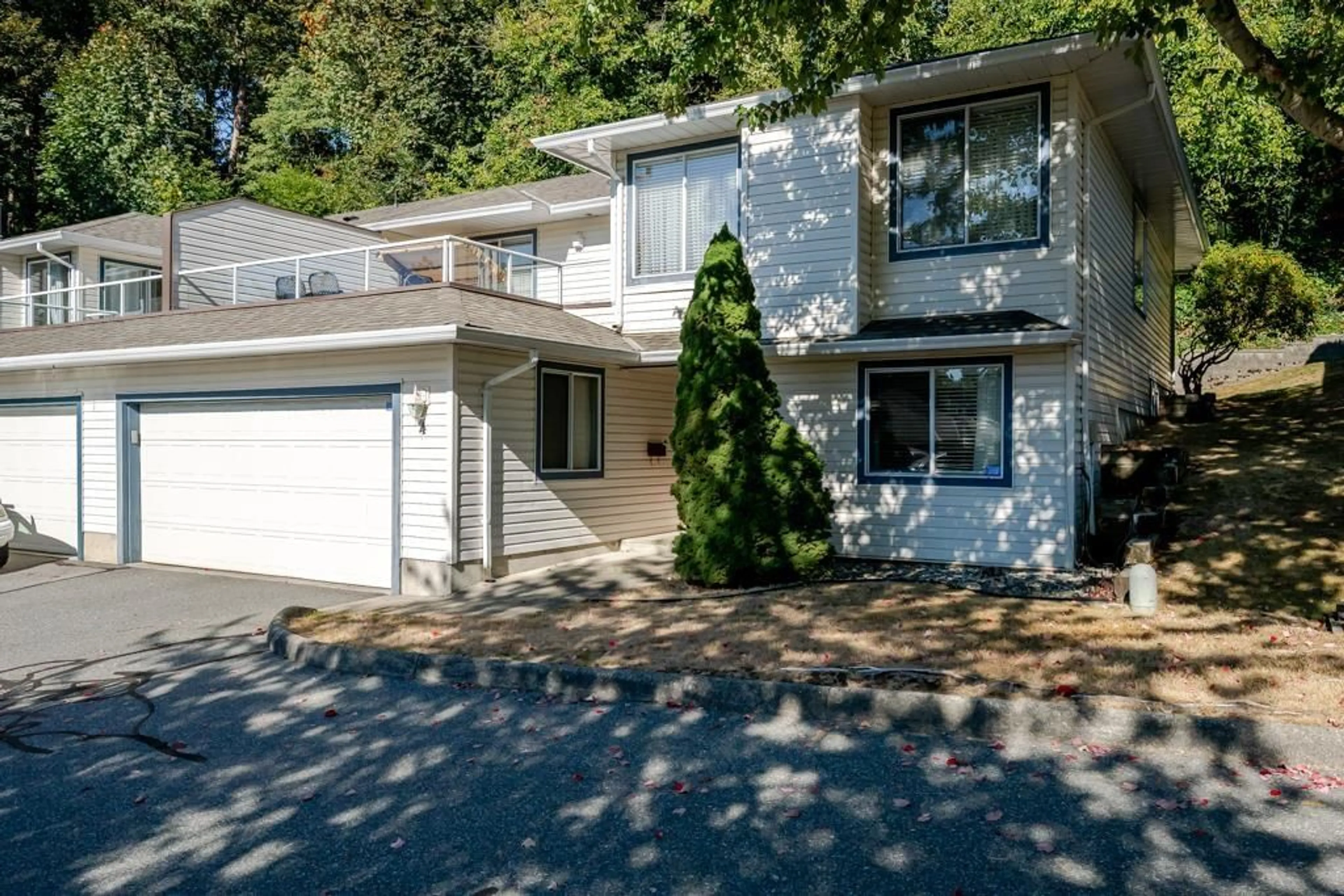 Home with vinyl exterior material, street for 4 - 3051 CROSSLEY DRIVE, Abbotsford British Columbia V2T5R4