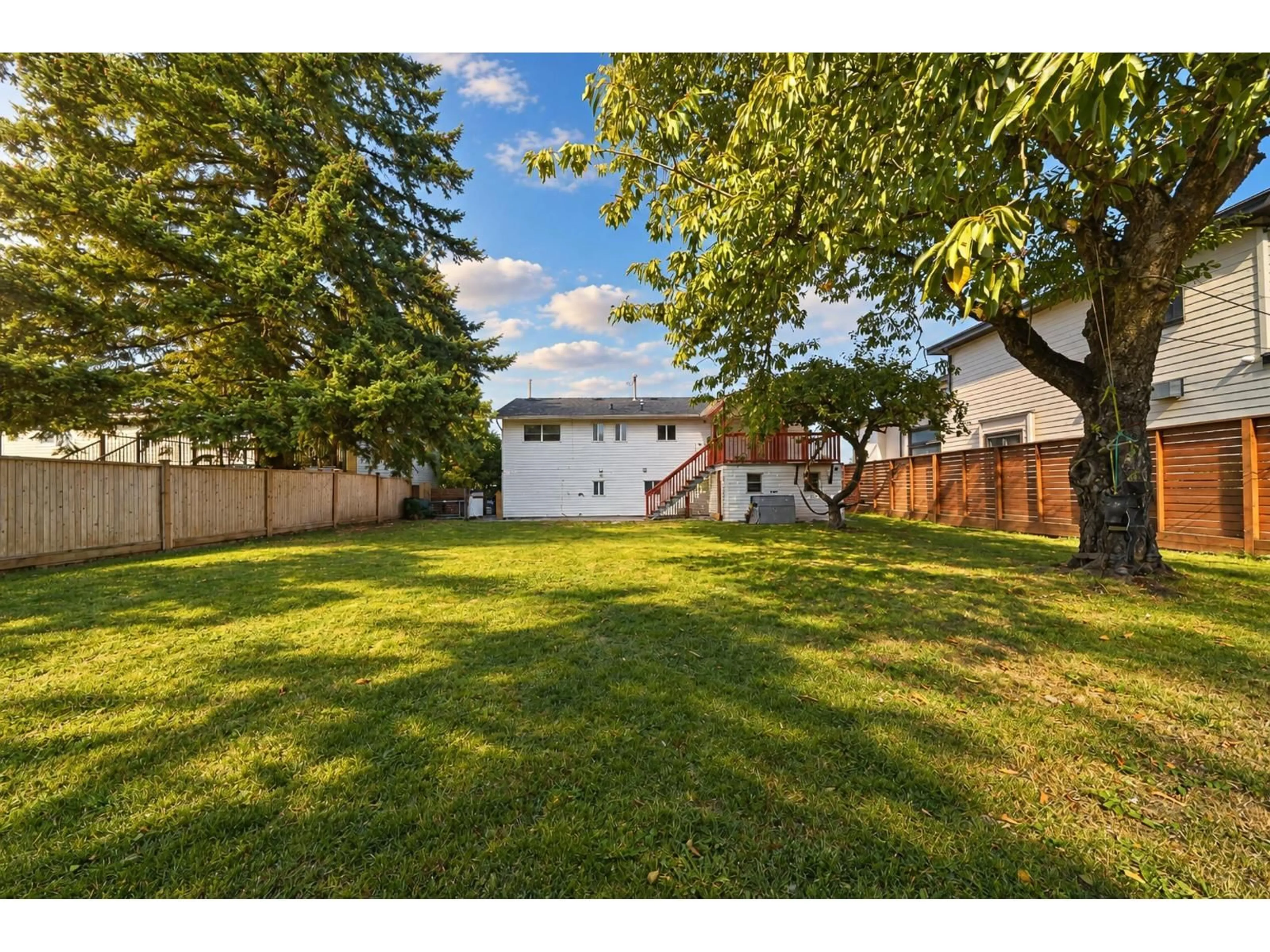 A pic from outside/outdoor area/front of a property/back of a property/a pic from drone, street for 14490 106A AVENUE, Surrey British Columbia V3R1T4