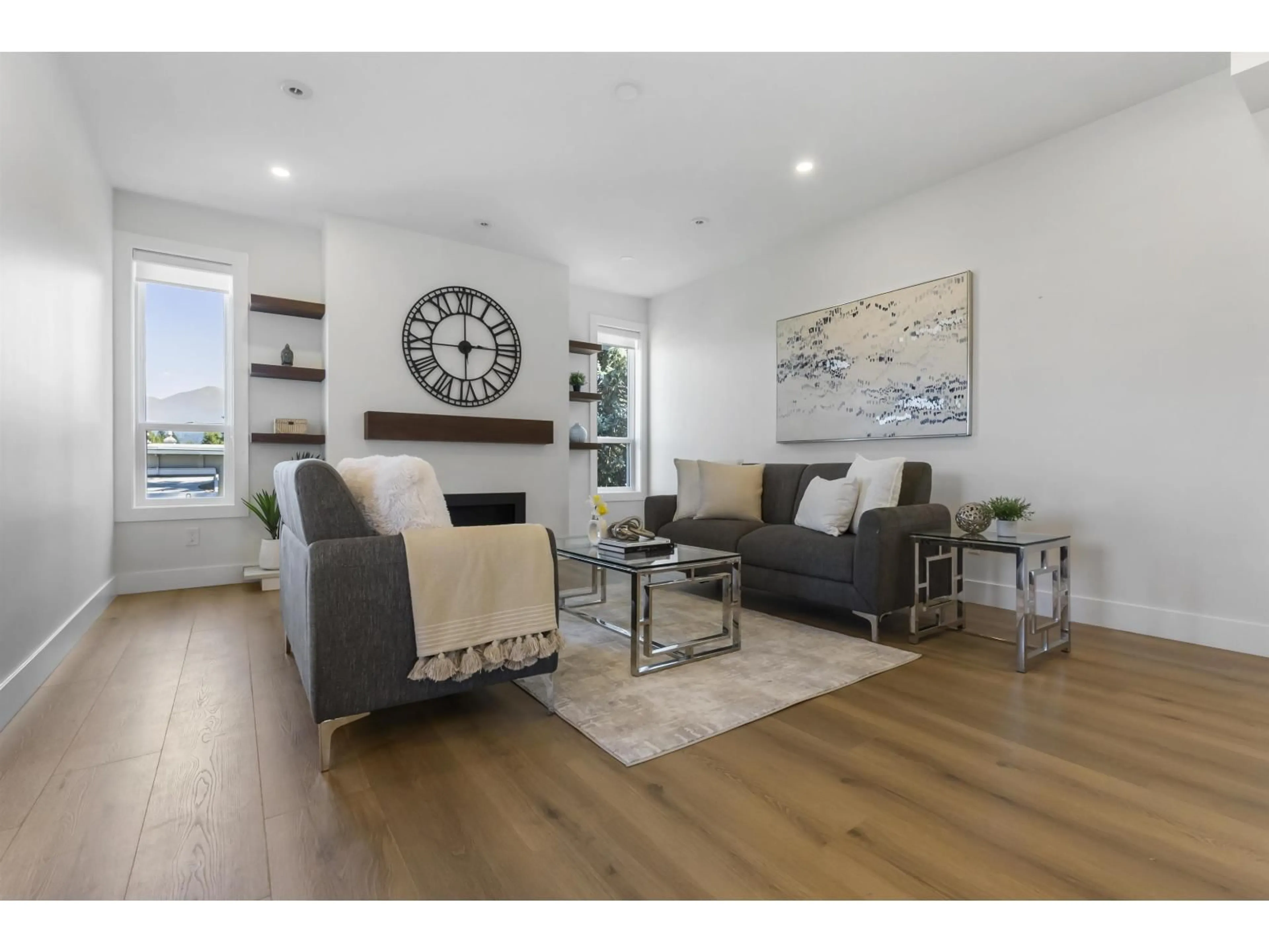 Living room with furniture, wood/laminate floor for 6048 ARLINGTON DRIVE, Chilliwack British Columbia V2R2J6