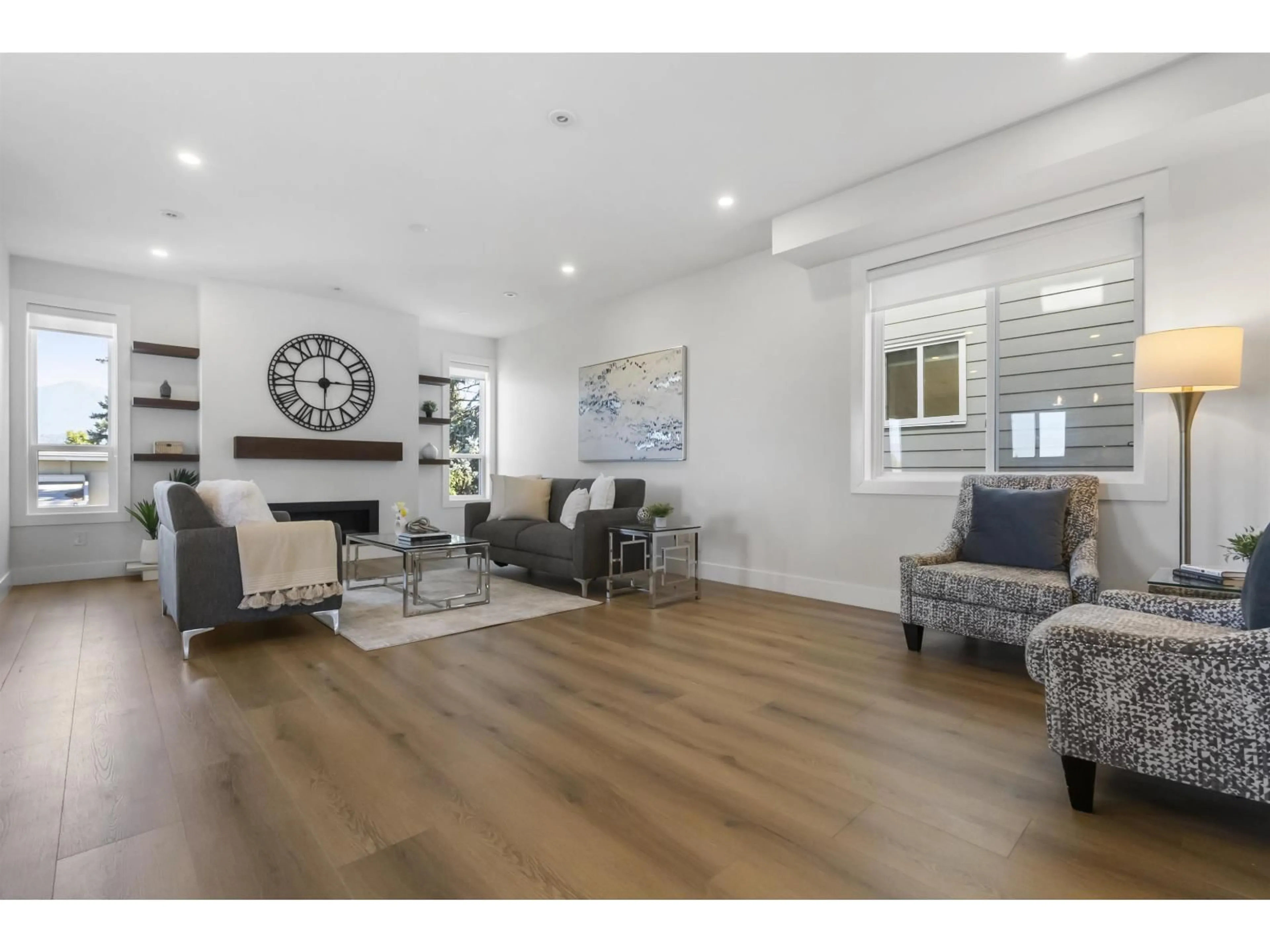 Living room with furniture, wood/laminate floor for 6048 ARLINGTON DRIVE, Chilliwack British Columbia V2R2J6