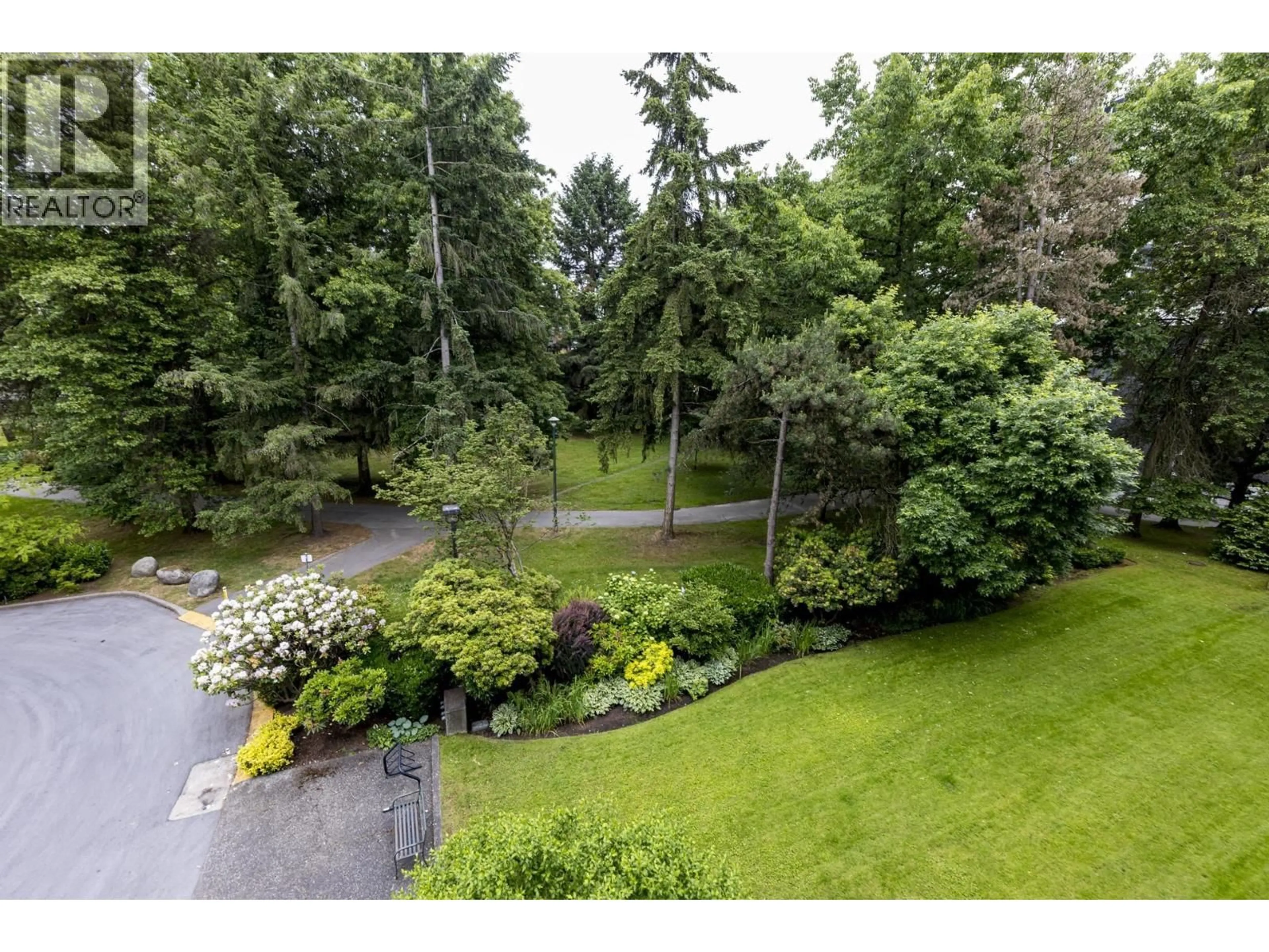 A pic from outside/outdoor area/front of a property/back of a property/a pic from drone, forest/trees view for 407 - 4101 YEW STREET, Vancouver British Columbia V6L3B7