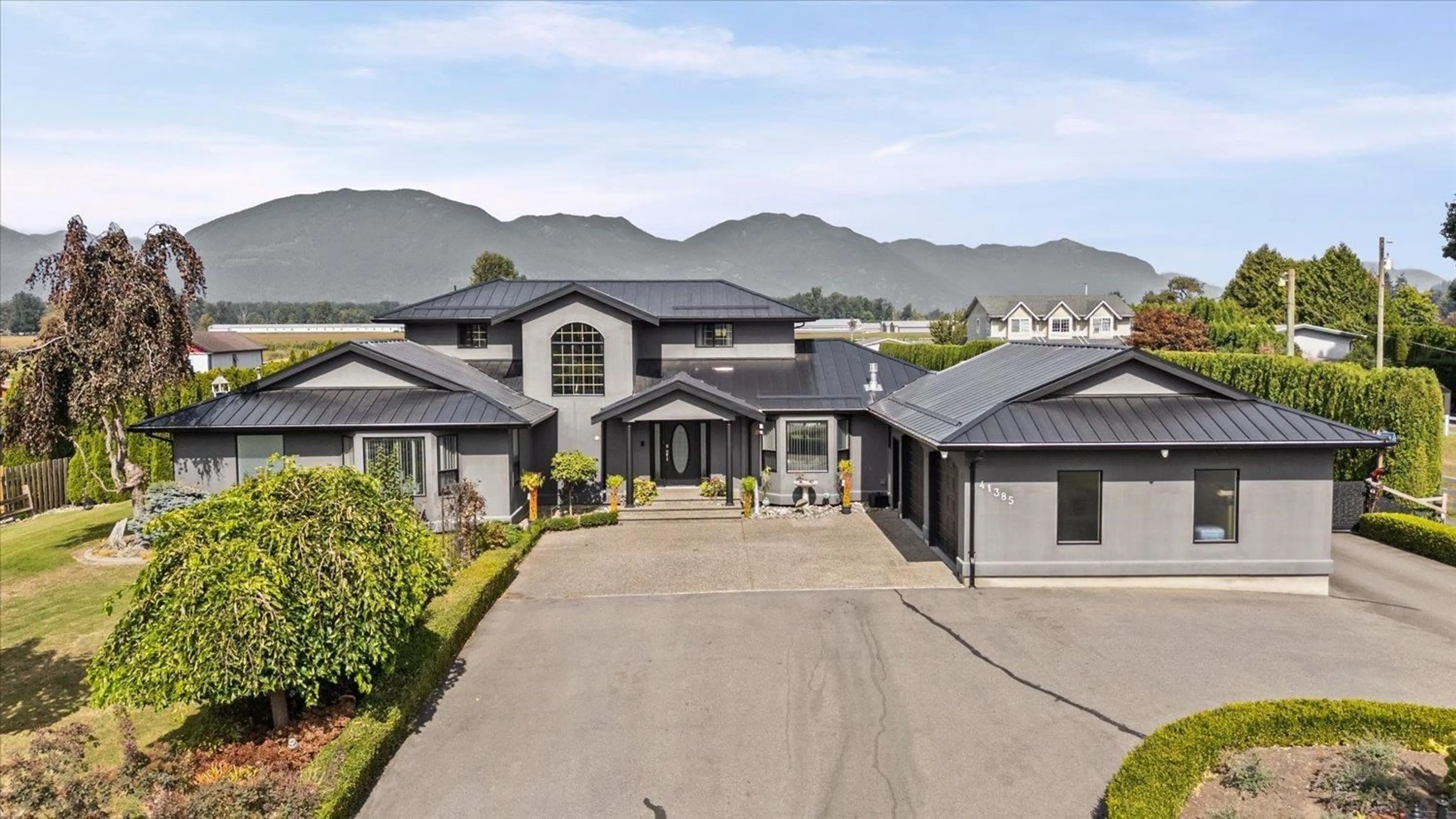 A pic from outside/outdoor area/front of a property/back of a property/a pic from drone, mountain view for 41385 SOUTH SUMAS ROAD, Sardis - Greendale British Columbia V2R4K5