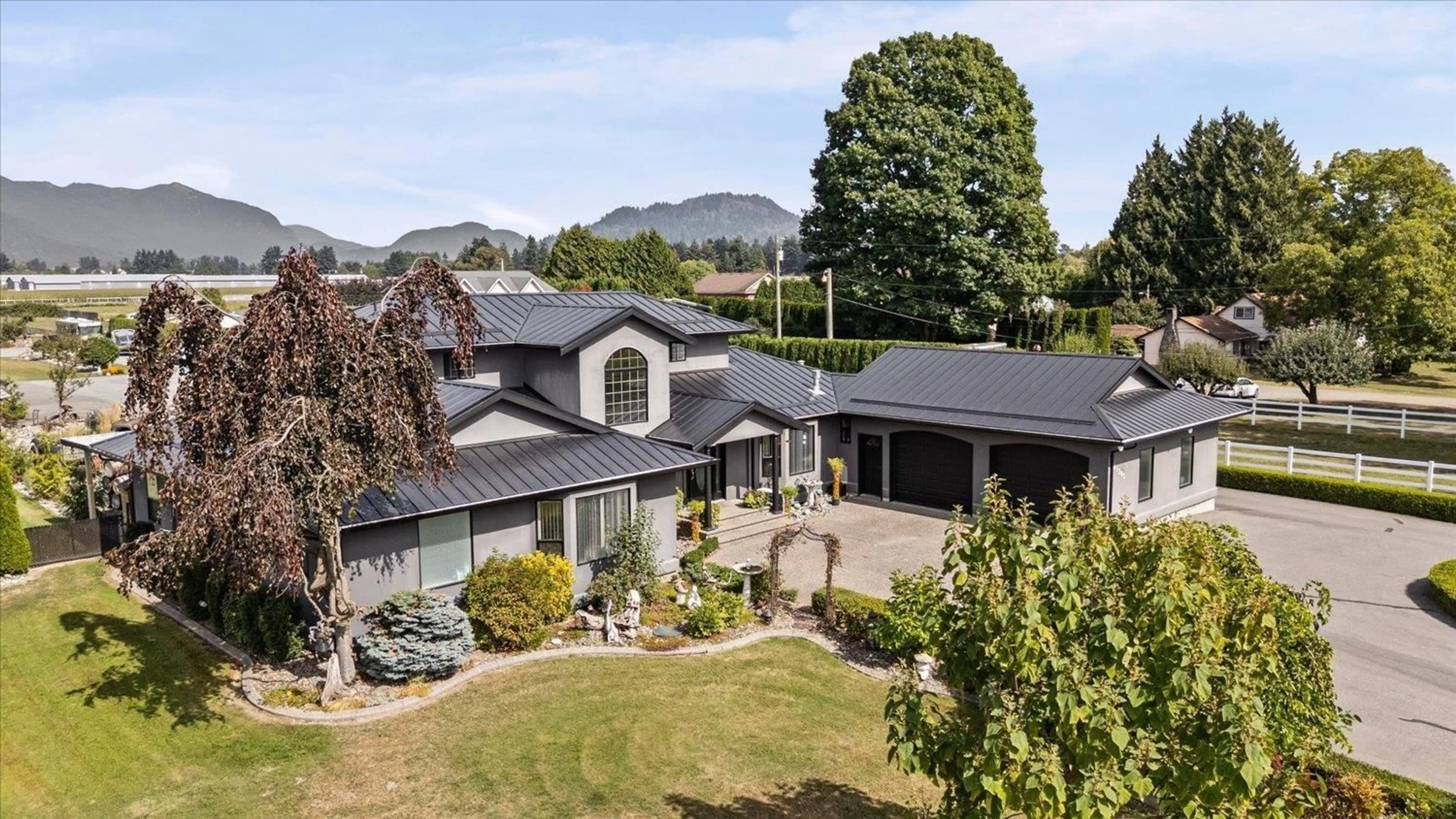 A pic from outside/outdoor area/front of a property/back of a property/a pic from drone, mountain view for 41385 SOUTH SUMAS ROAD, Sardis - Greendale British Columbia V2R4K5