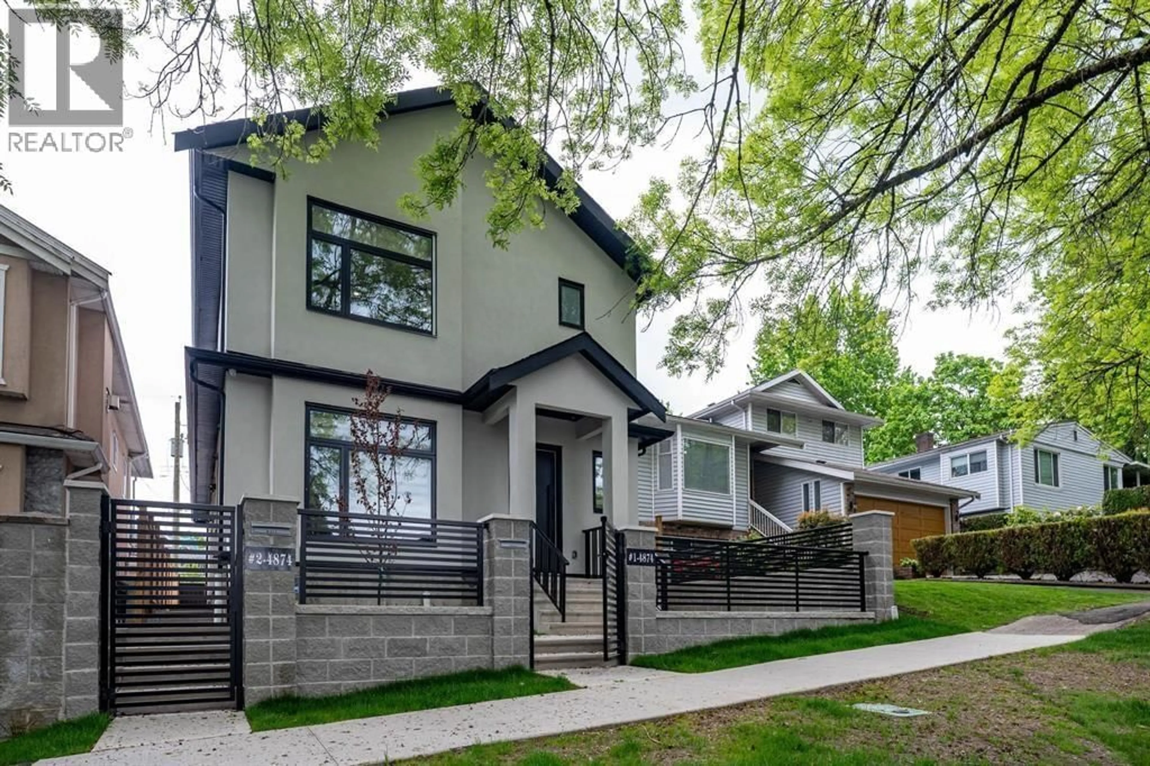 Home with brick exterior material, street for 1 - 4874 LANARK STREET, Vancouver British Columbia V5N3S2