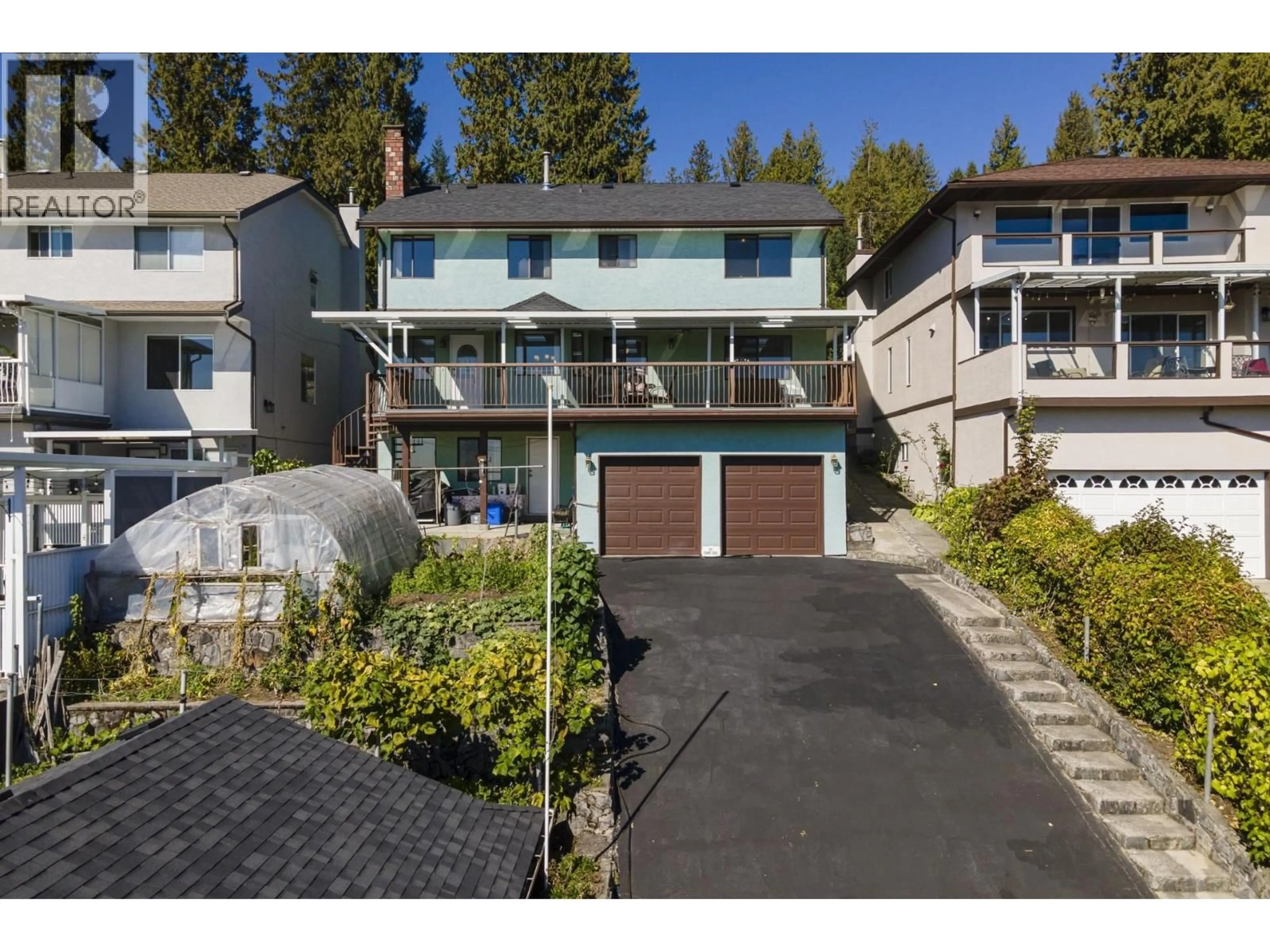 A pic from outside/outdoor area/front of a property/back of a property/a pic from drone, street for 557 TEMPE CRESCENT, North Vancouver British Columbia V7N1E7
