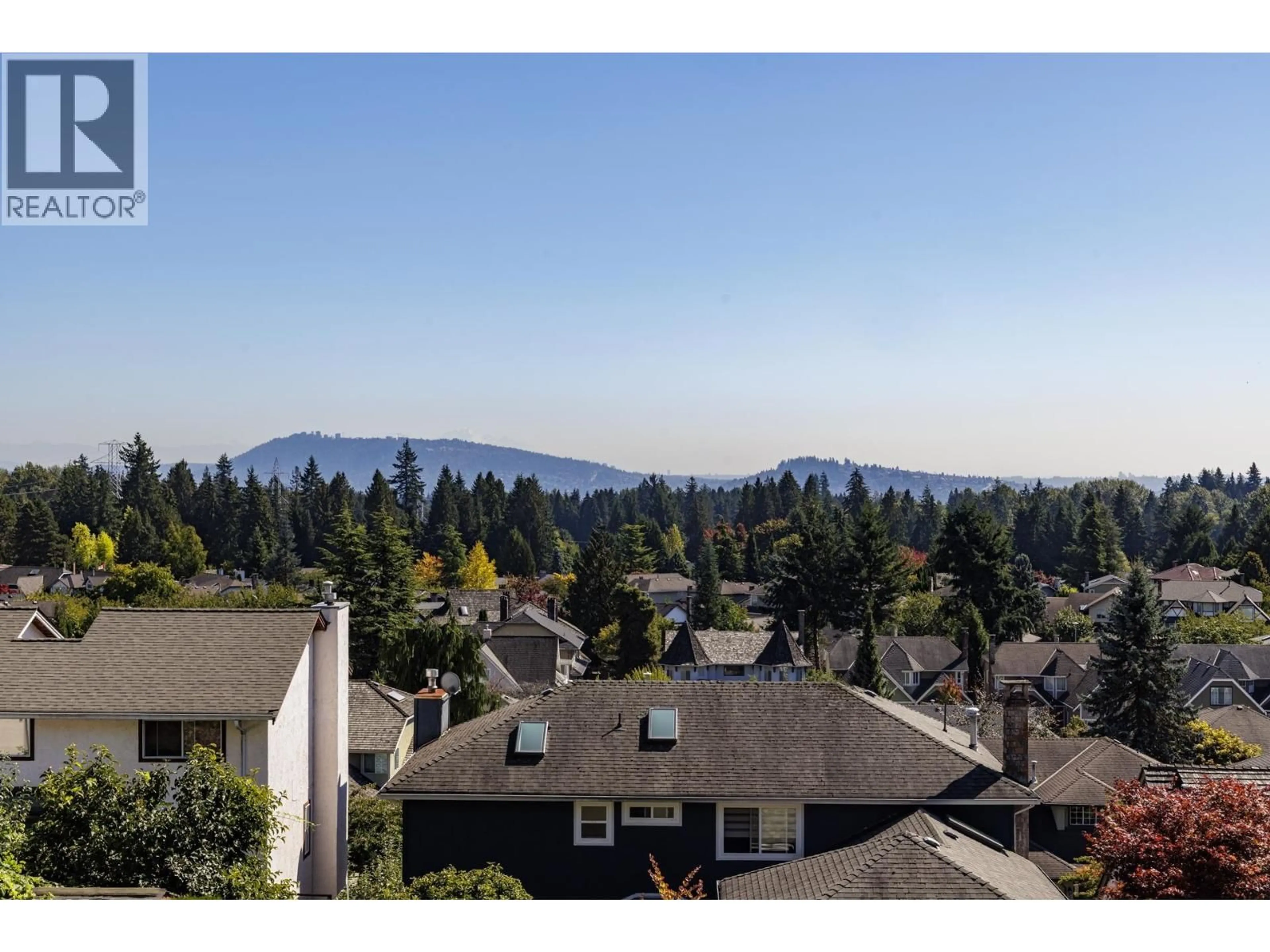A pic from outside/outdoor area/front of a property/back of a property/a pic from drone, mountain view for 557 TEMPE CRESCENT, North Vancouver British Columbia V7N1E7