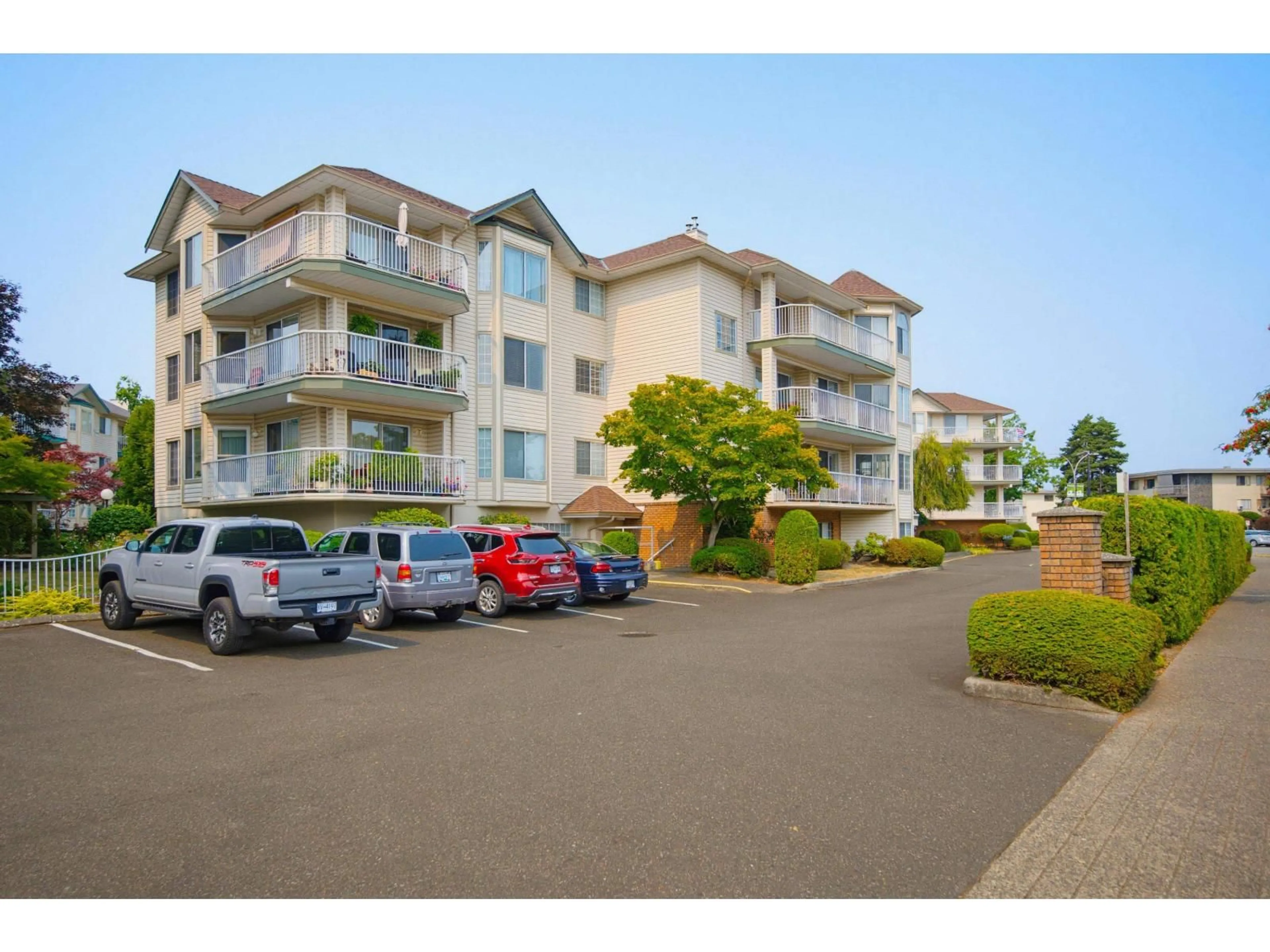 A pic from outside/outdoor area/front of a property/back of a property/a pic from drone, water/lake/river/ocean view for 210 - 5363 206 STREET, Langley British Columbia V3A2C5