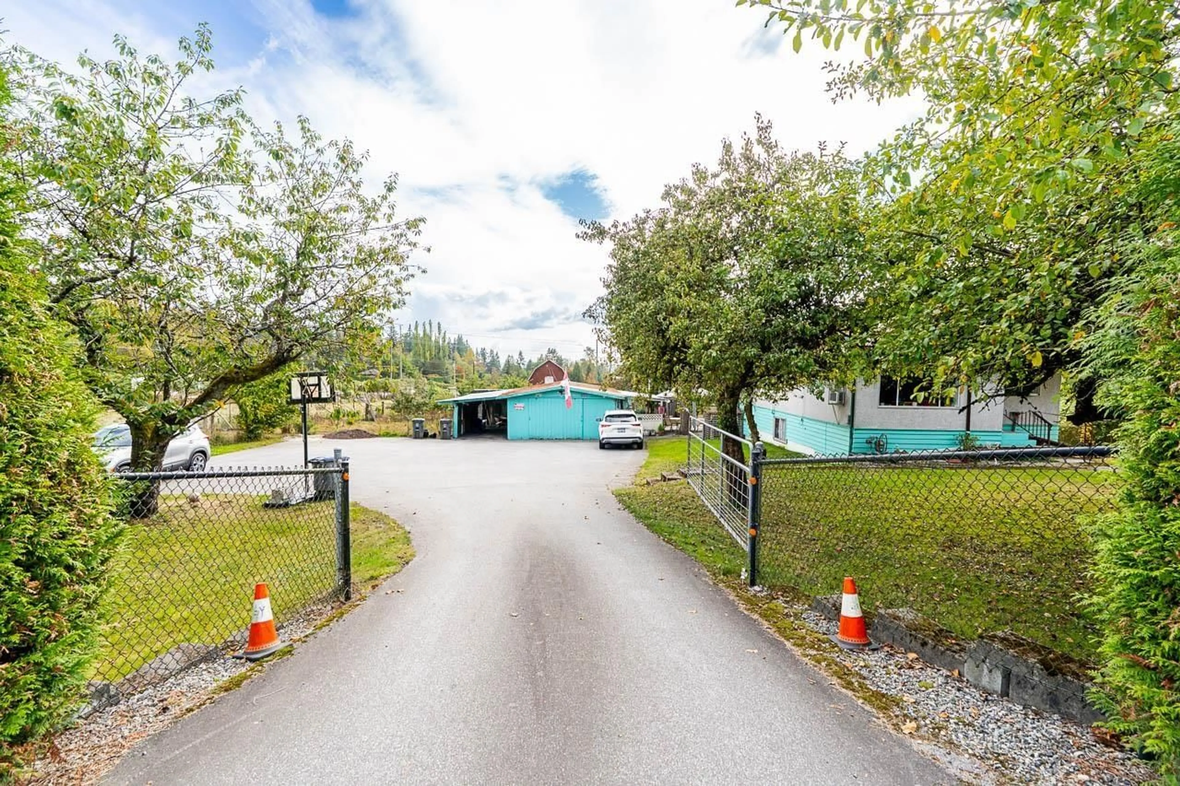 A pic from outside/outdoor area/front of a property/back of a property/a pic from drone, street for 17328 96 AVENUE, Surrey British Columbia V4N6H4