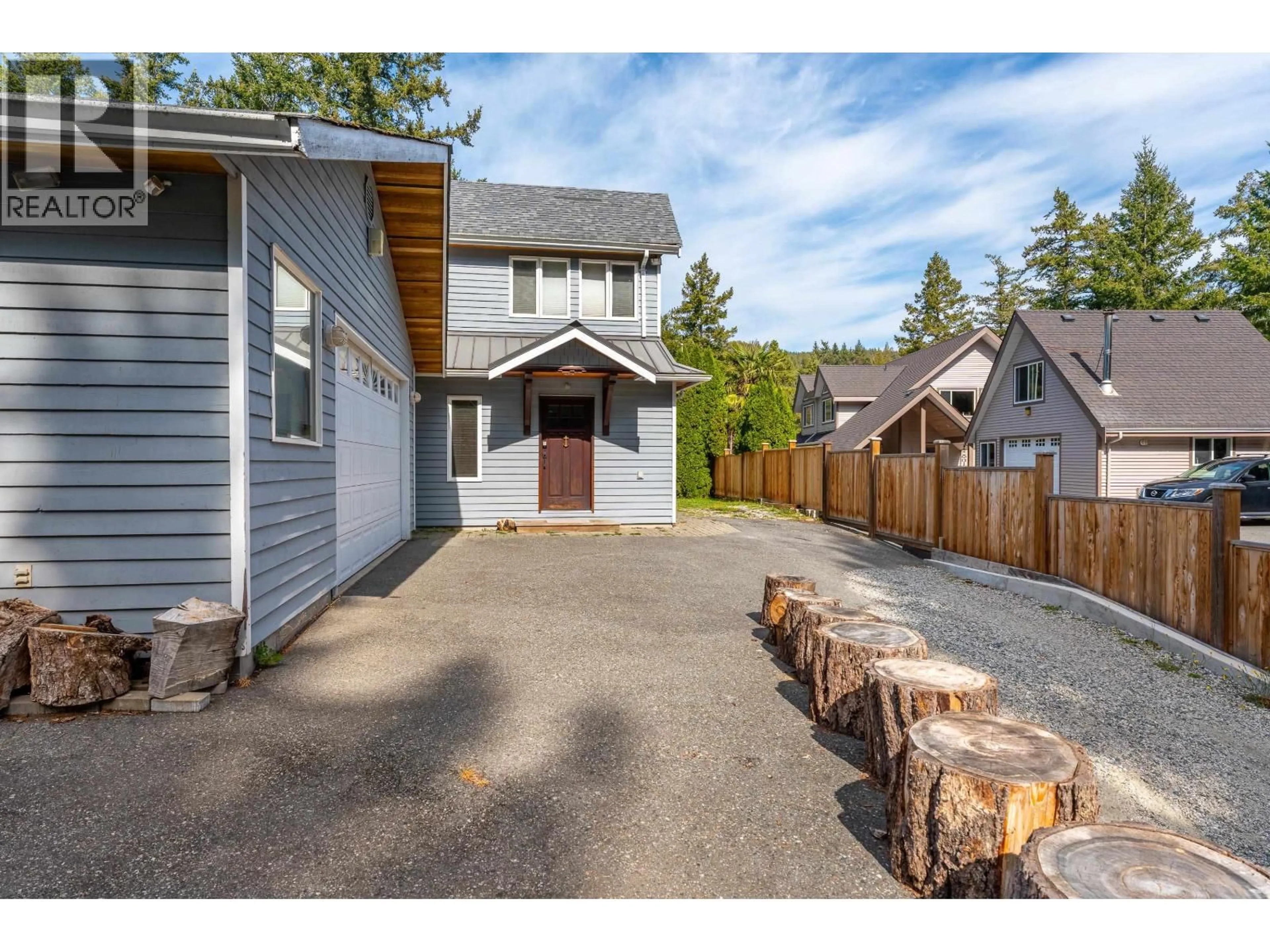 A pic from outside/outdoor area/front of a property/back of a property/a pic from drone, street for 5393 SANS SOUCI ROAD, Halfmoon Bay British Columbia V7Z1B6