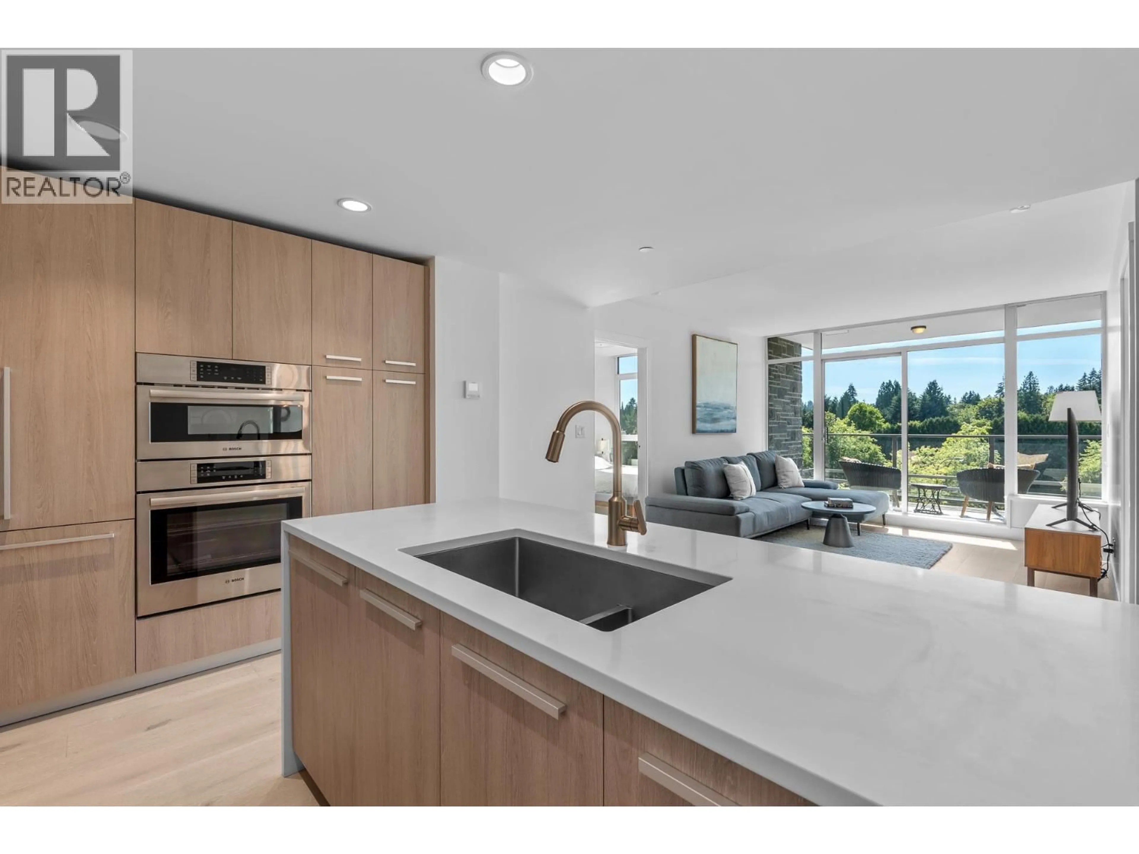 Open concept kitchen, ceramic/tile floor for 404 - 1210 27TH STREET, North Vancouver British Columbia V7J0C5