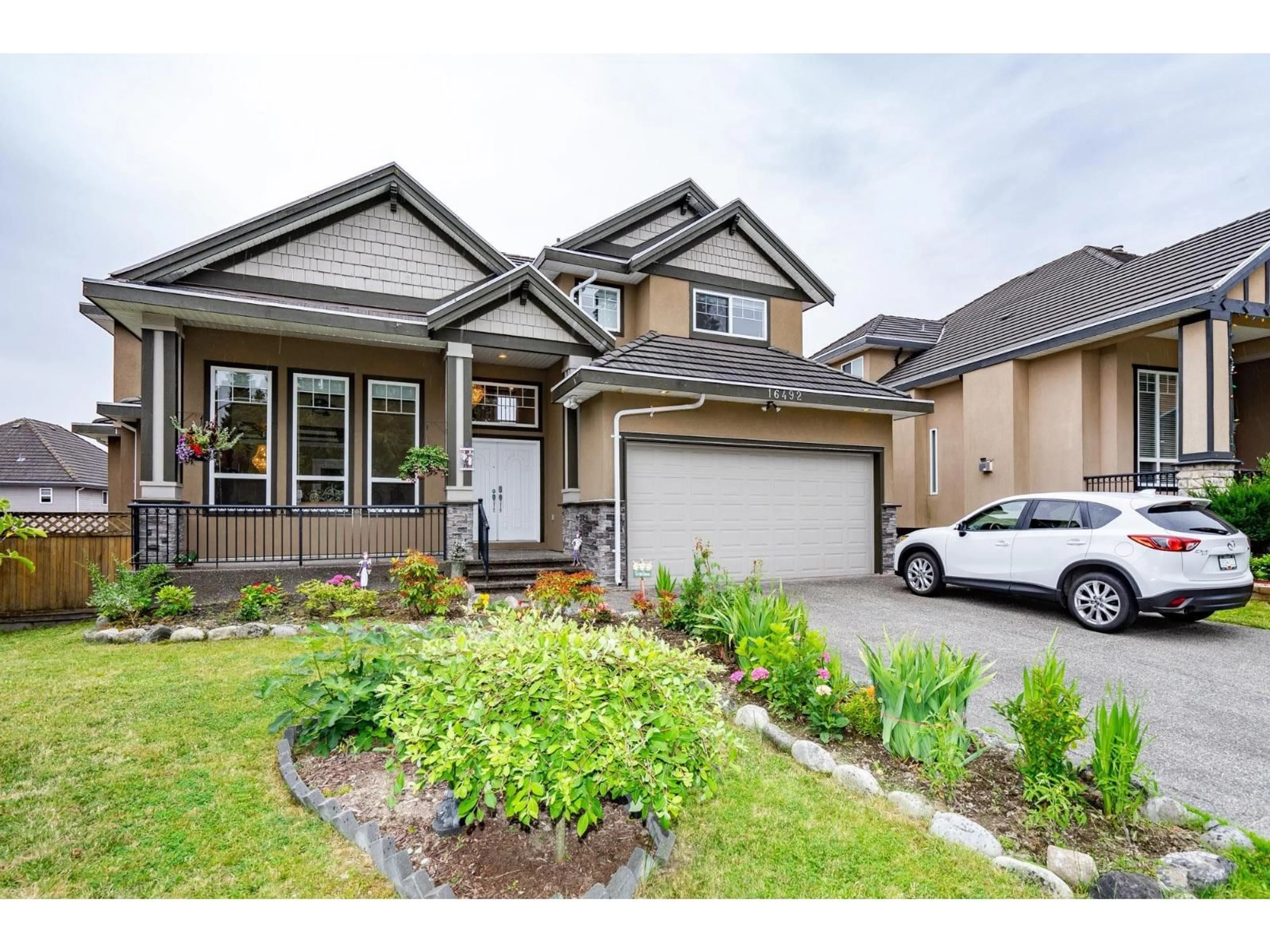 Home with brick exterior material, street for 16492 104A AVENUE, Surrey British Columbia V4N5S6