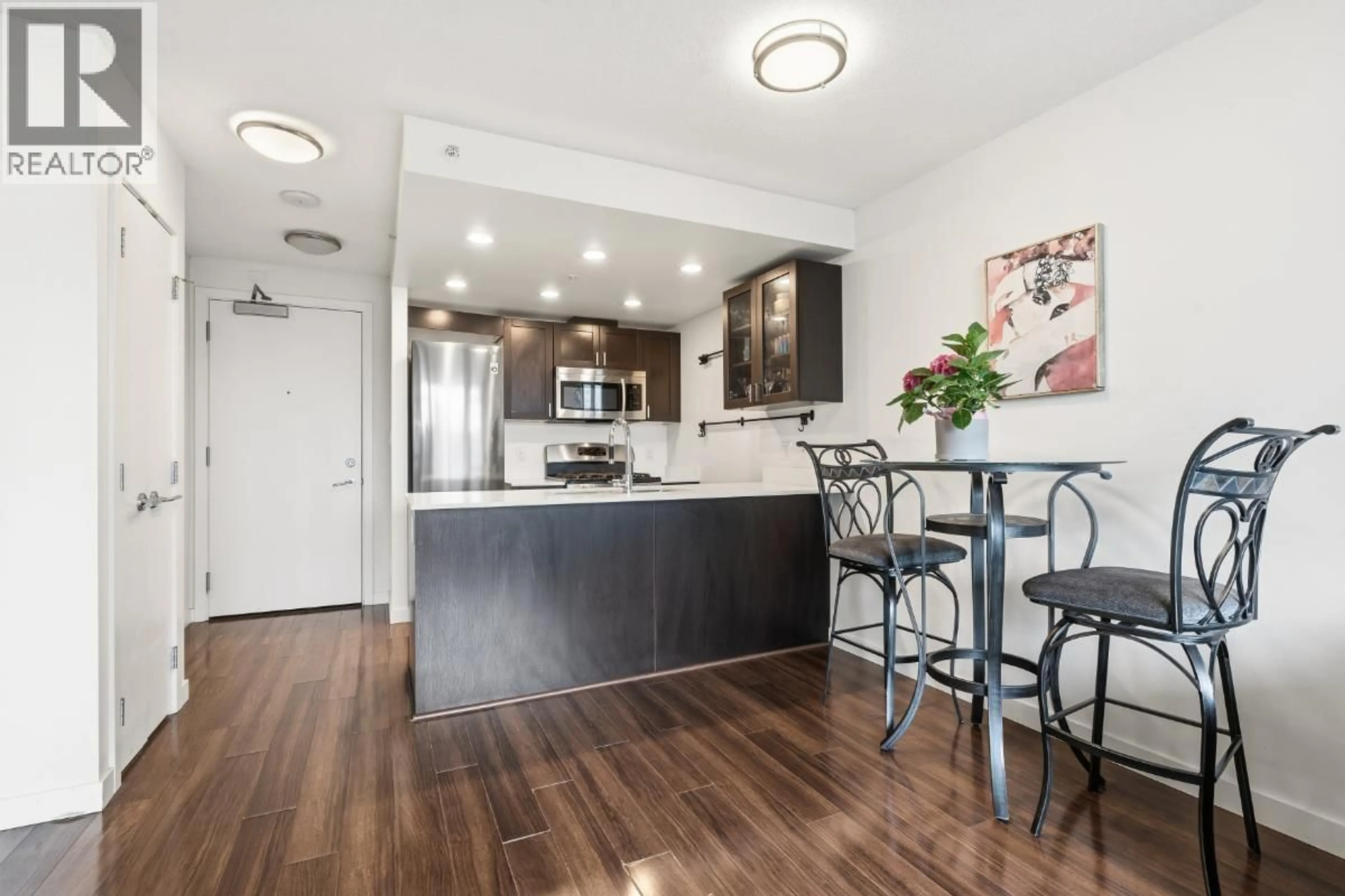 Open concept kitchen, wood/laminate floor for 319 - 4818 ELDORADO MEWS, Vancouver British Columbia V5R0B3