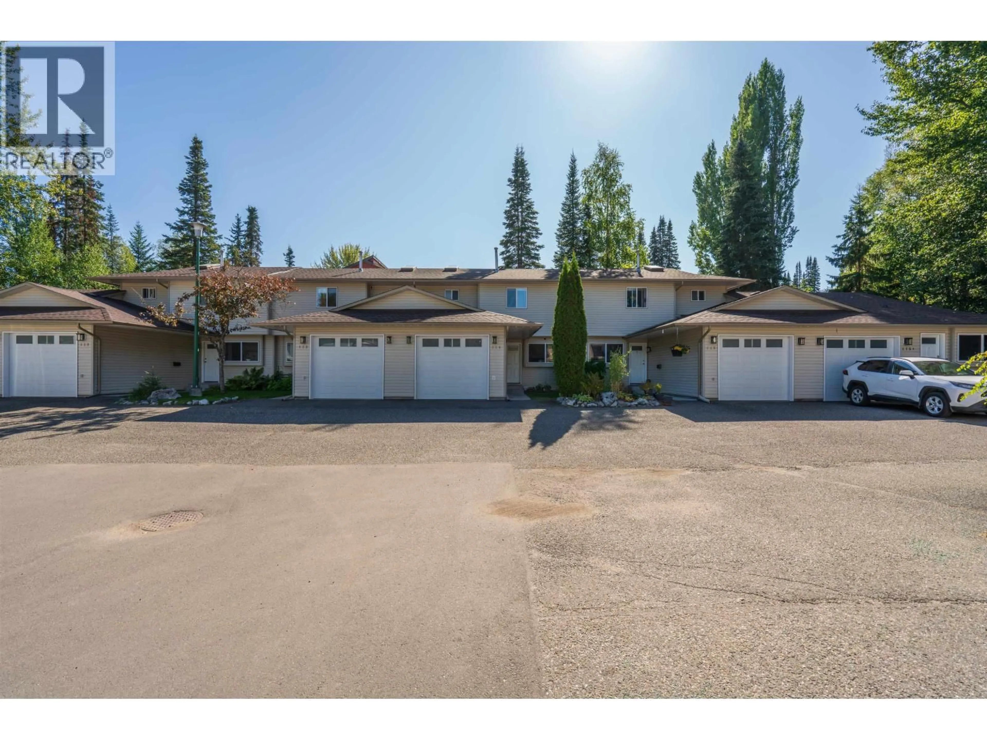 A pic from outside/outdoor area/front of a property/back of a property/a pic from drone, unknown for 114 - 3885 RICHET STREET, Prince George British Columbia V2K2J2