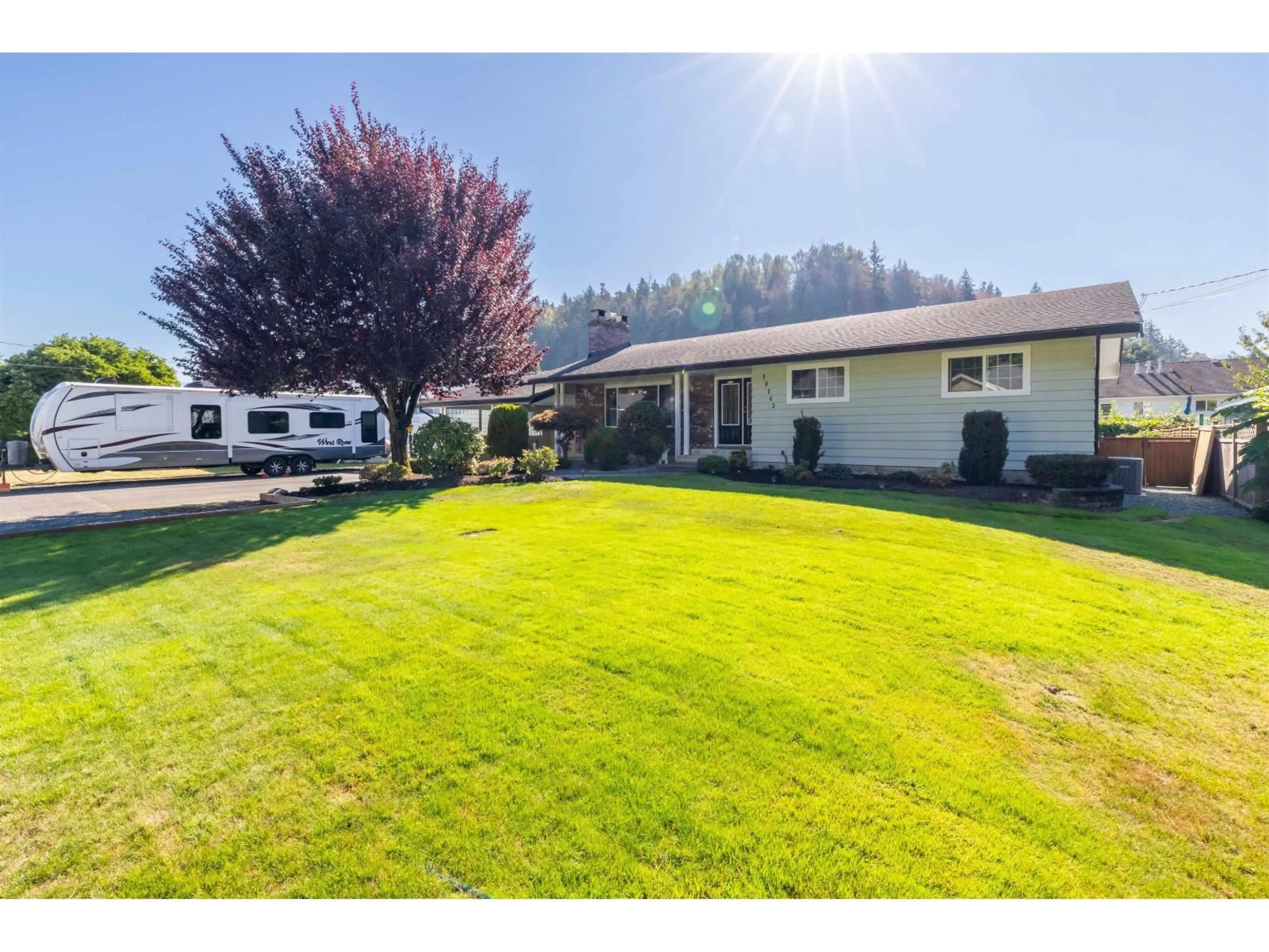 A pic from outside/outdoor area/front of a property/back of a property/a pic from drone, mountain view for 10145 BRENTWOOD DRIVE, Chilliwack British Columbia V2P6G5