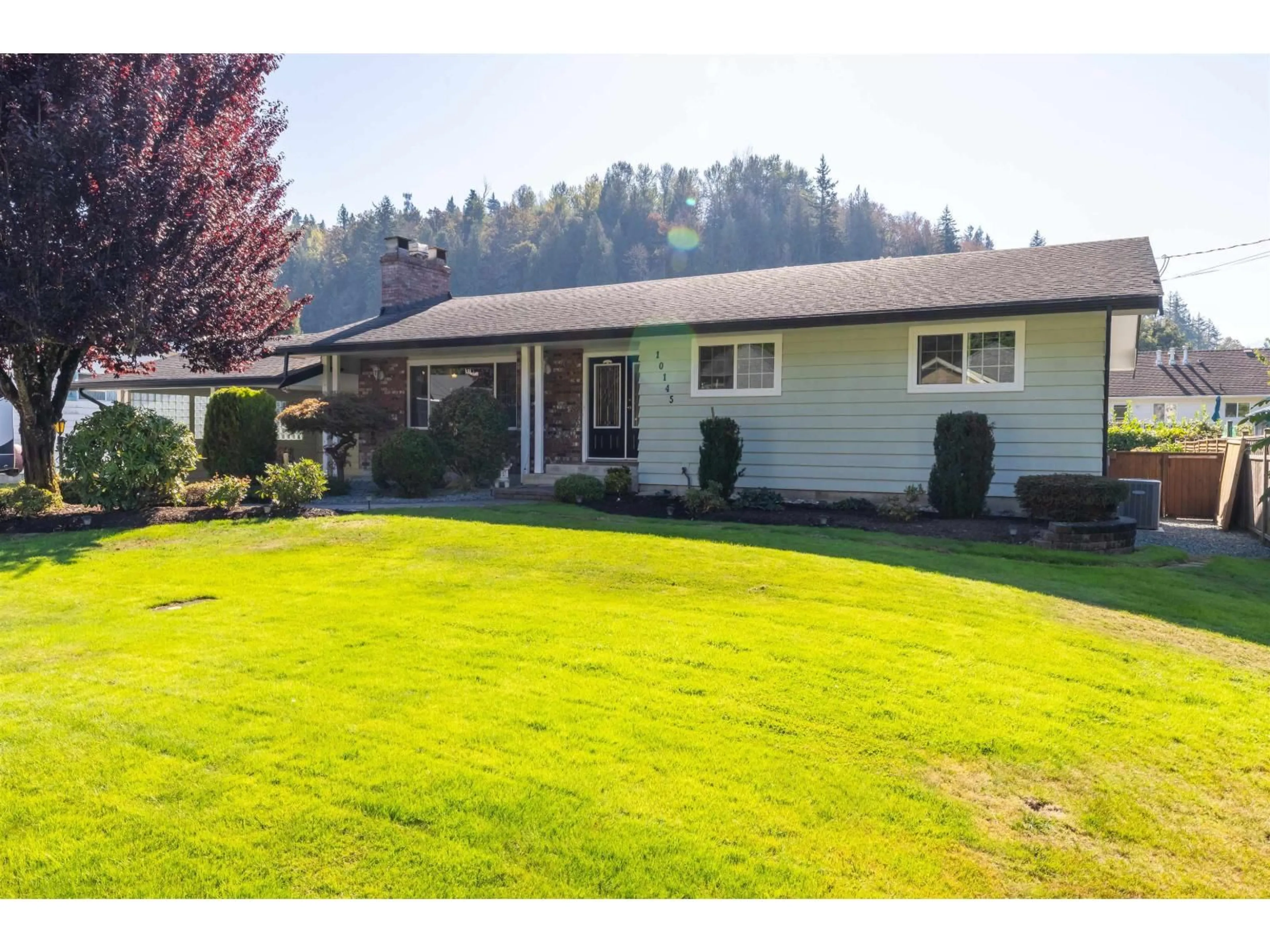 Home with vinyl exterior material, mountain view for 10145 BRENTWOOD DRIVE, Chilliwack British Columbia V2P6G5