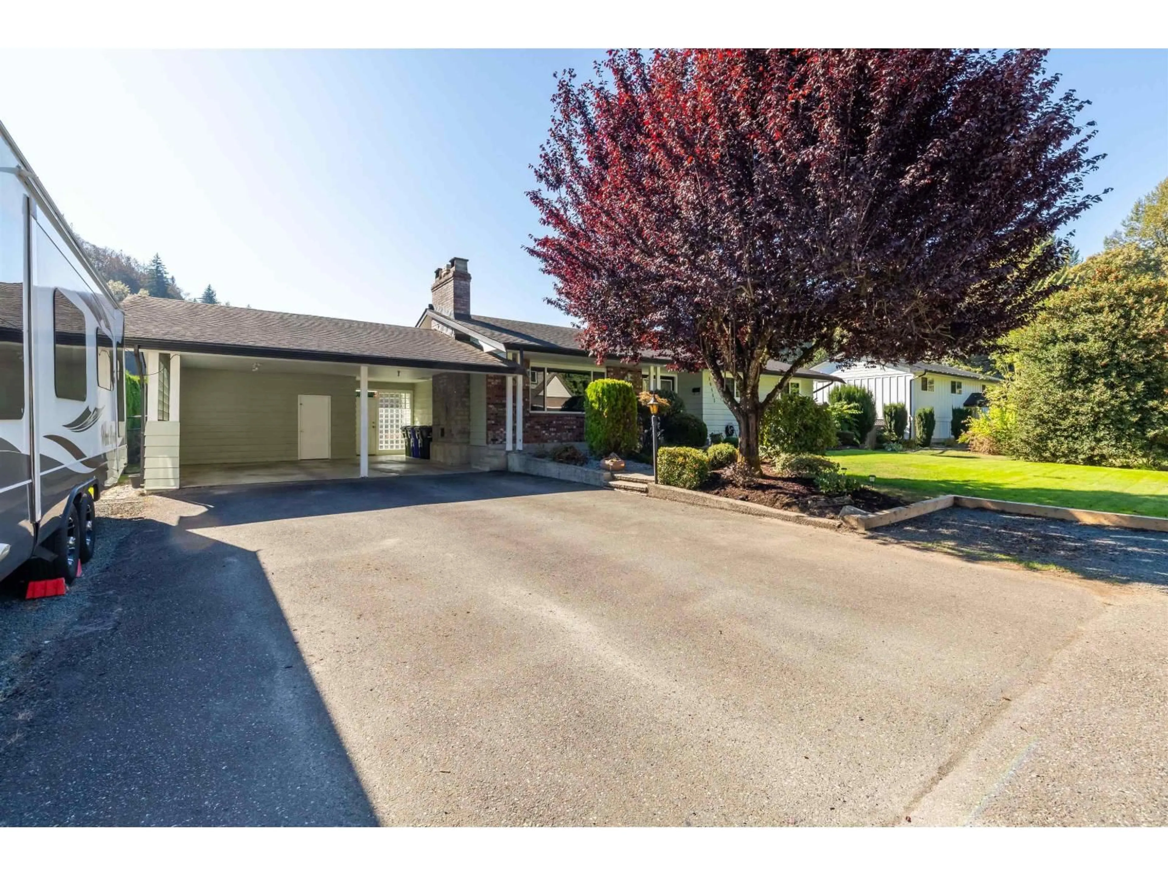 A pic from outside/outdoor area/front of a property/back of a property/a pic from drone, street for 10145 BRENTWOOD DRIVE, Chilliwack British Columbia V2P6G5