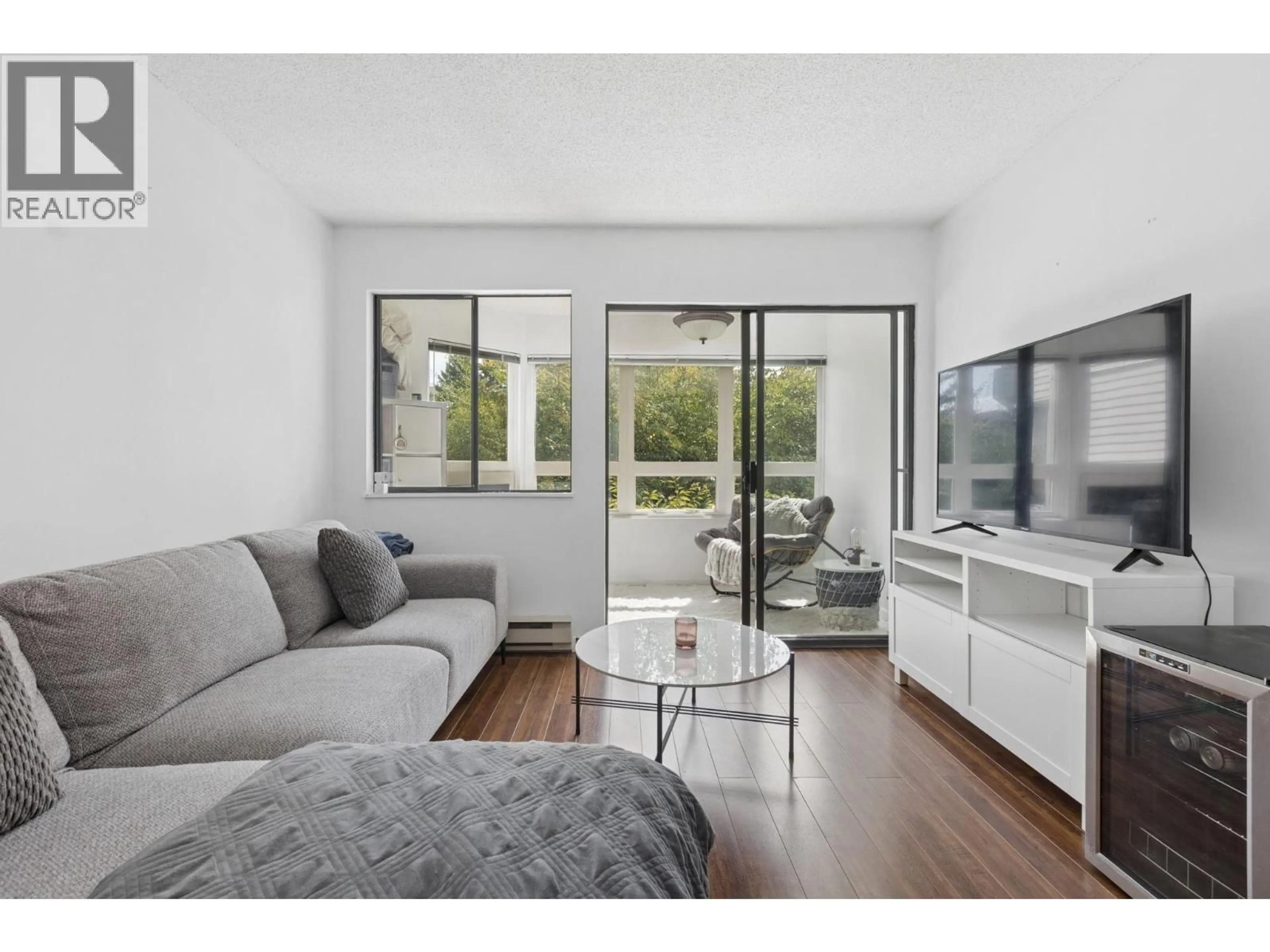 Living room with furniture, unknown for 204 - 1155 ROSS RD, North Vancouver British Columbia V7K1C6
