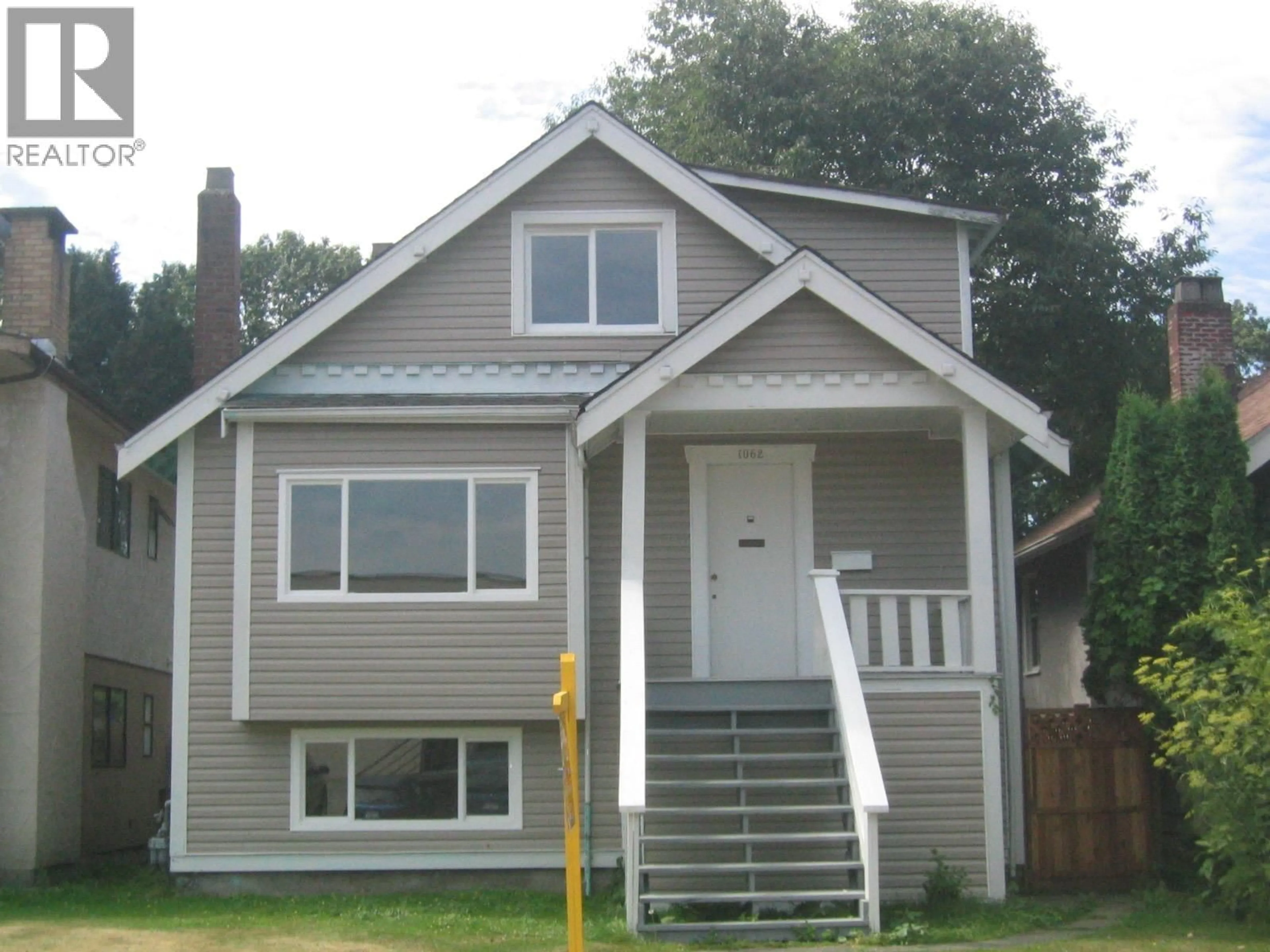 Home with vinyl exterior material, street for 1062 20TH AVENUE, Vancouver British Columbia V5V1N8