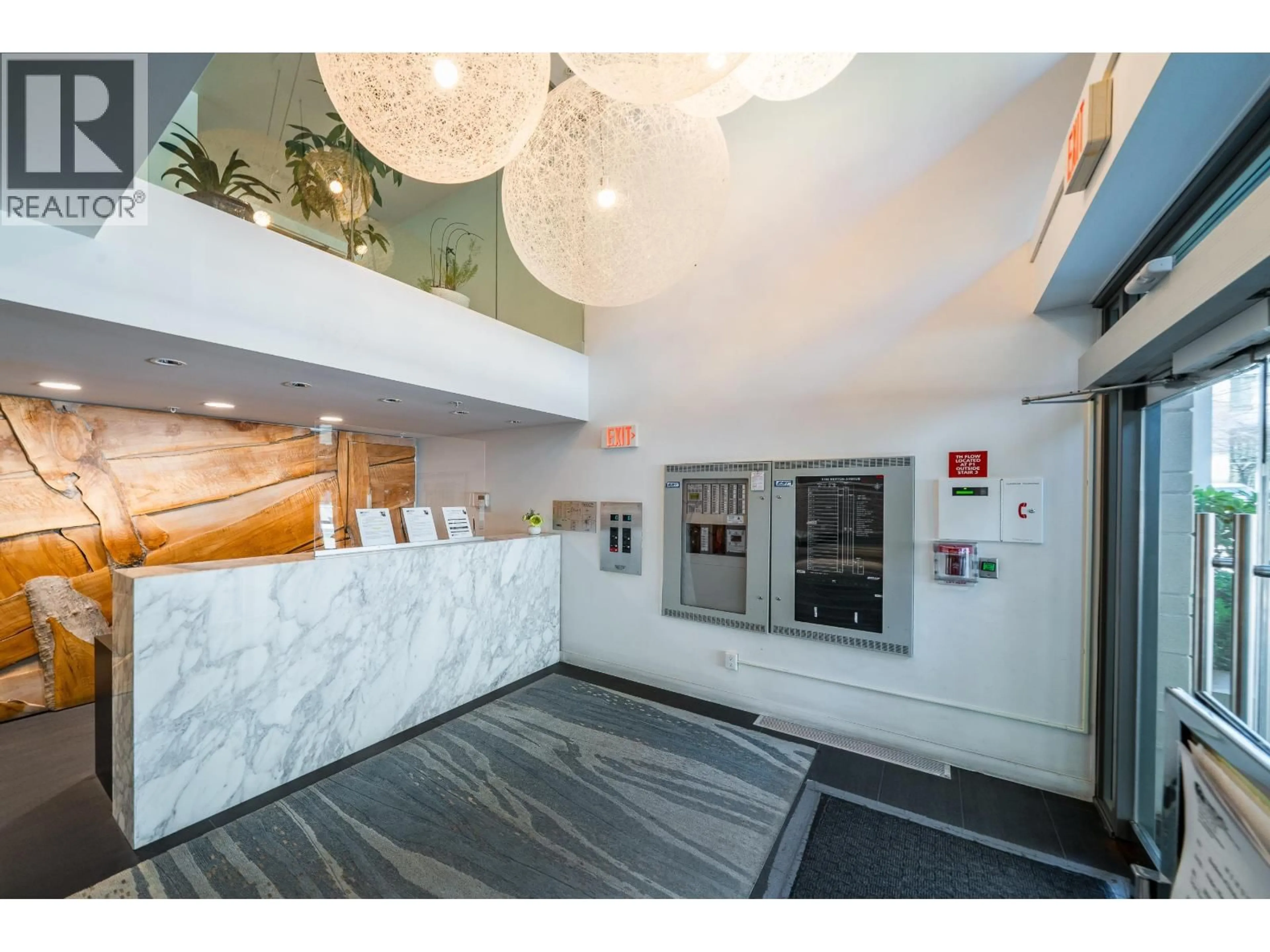 Indoor foyer for 203 - 5782 BERTON AVENUE, Vancouver British Columbia V6S0C1
