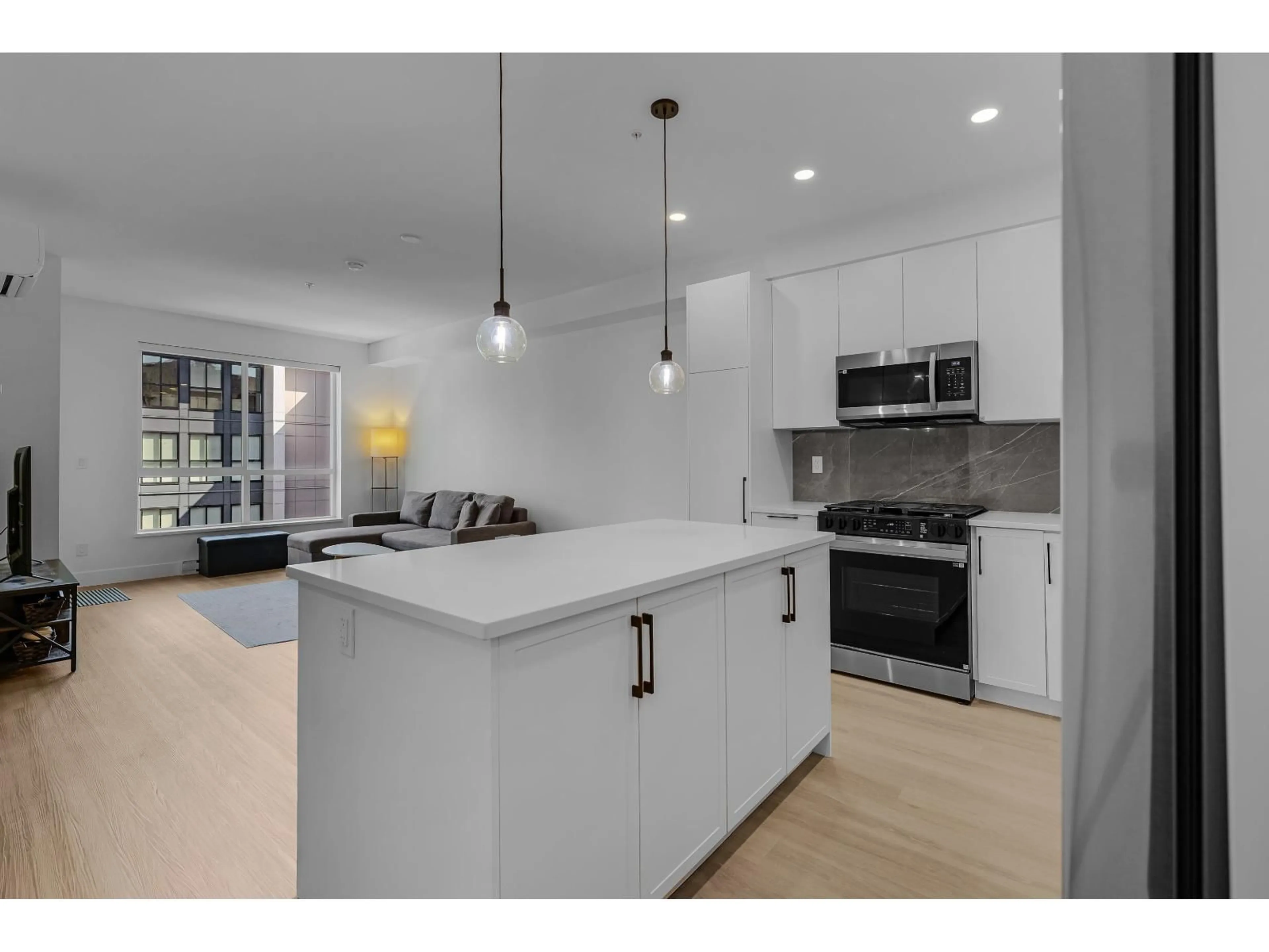Open concept kitchen, unknown for 501 - 3438 146A STREET, Surrey British Columbia V4P0J1