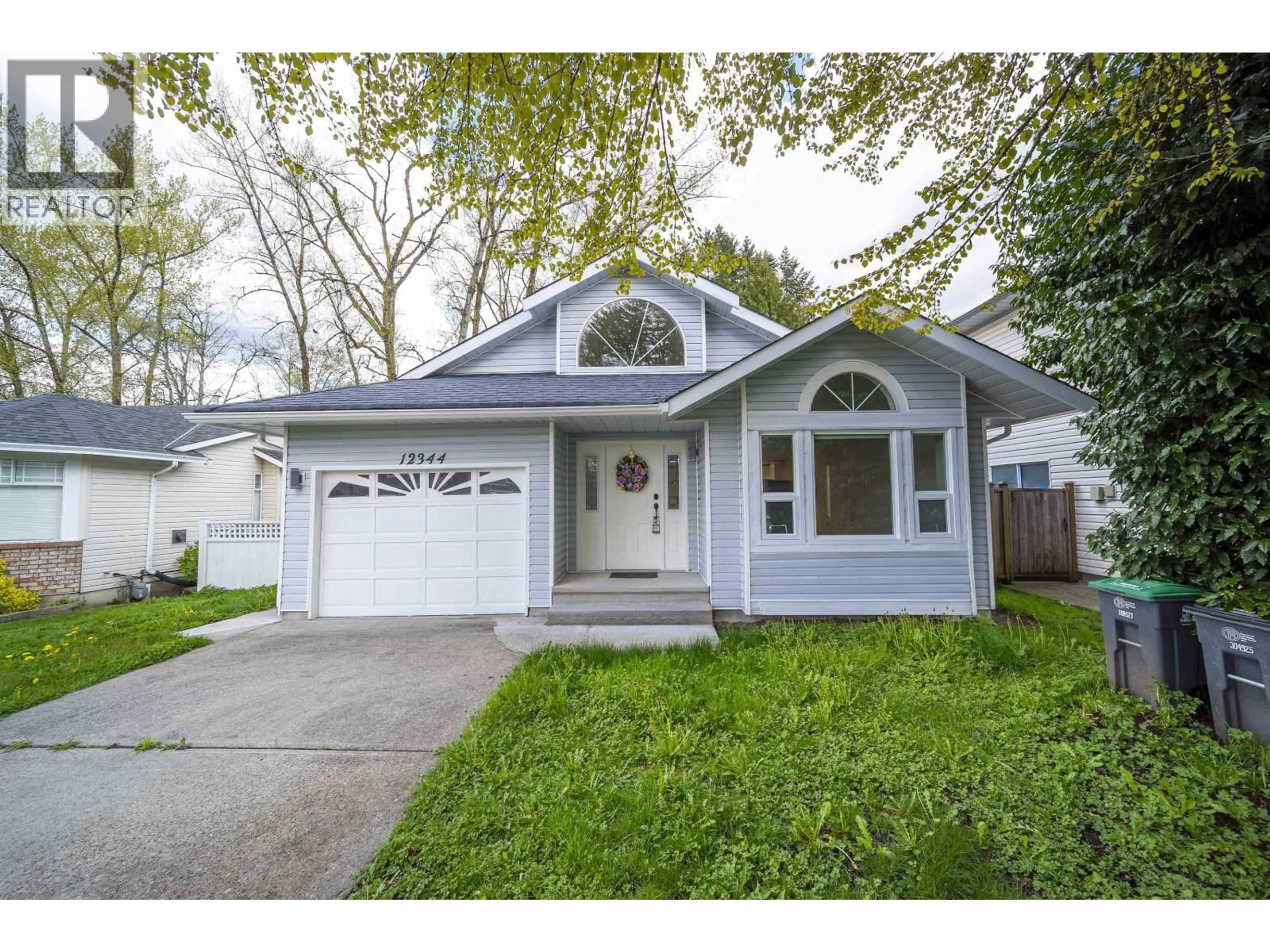 Home with vinyl exterior material, street for 12344 234 STREET, Maple Ridge British Columbia V2X0N7