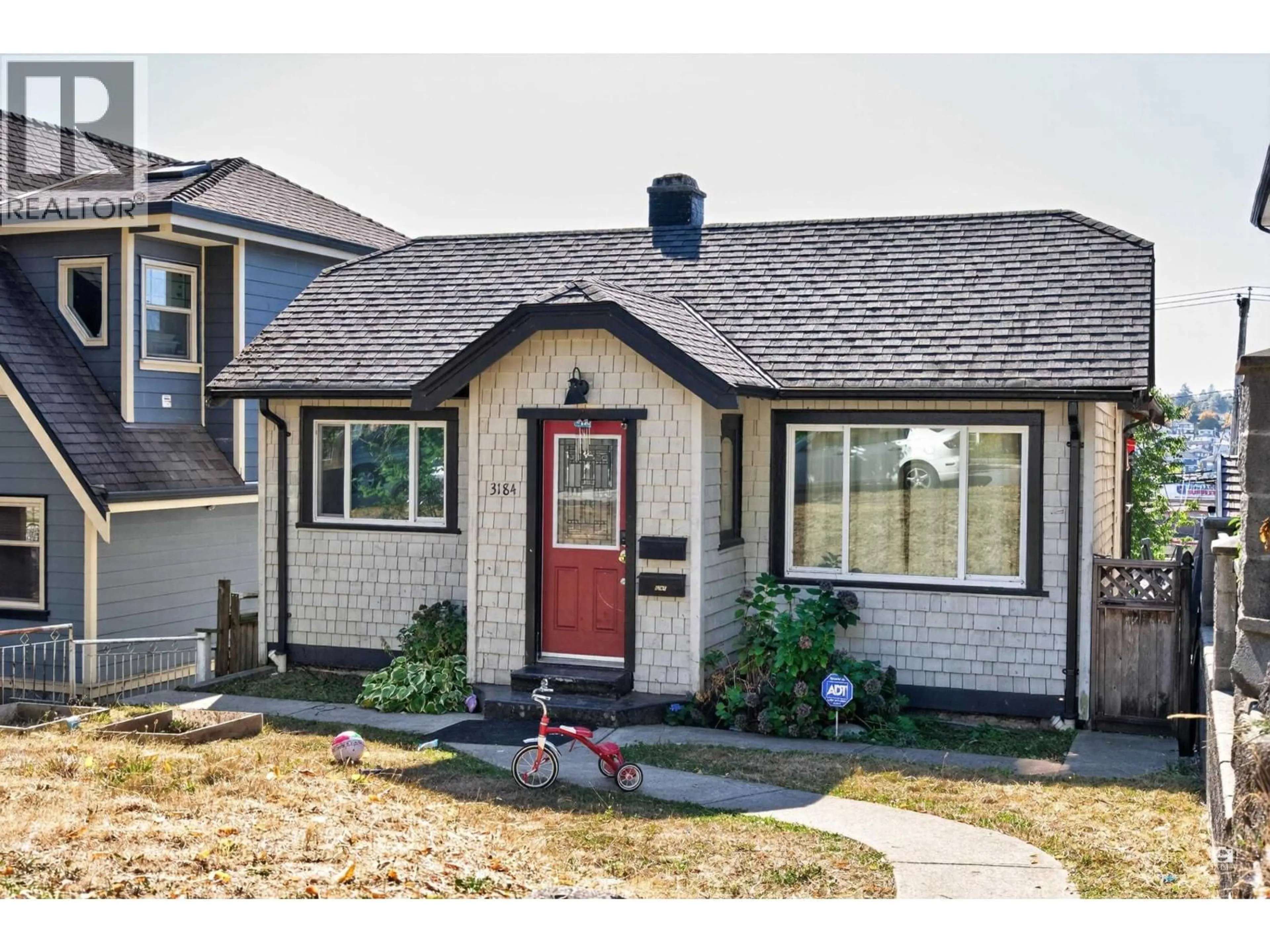 Home with vinyl exterior material, street for 3184 8TH AVENUE, Vancouver British Columbia V5M1X6