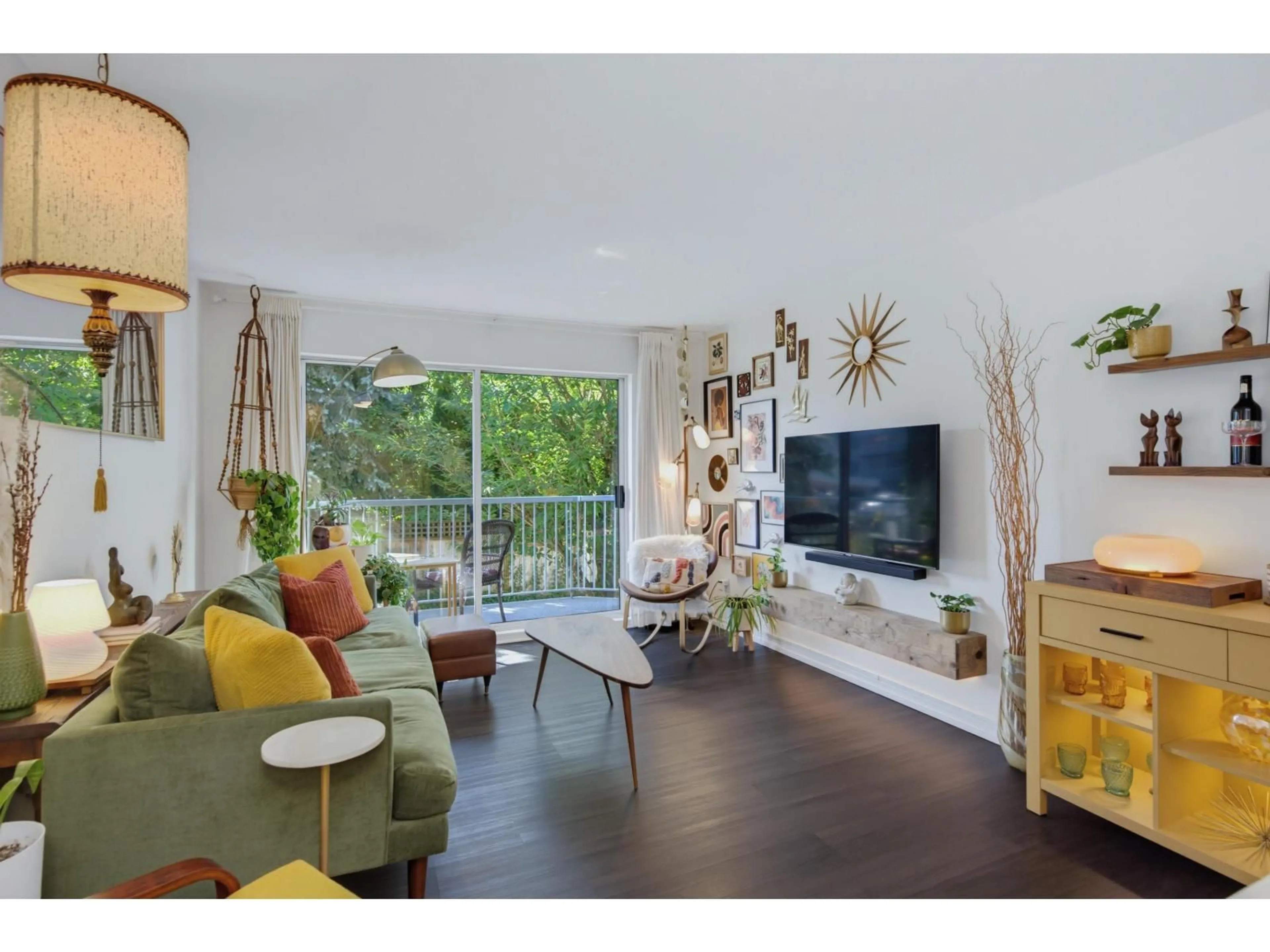 Living room with furniture, wood/laminate floor for 206 - 2750 FULLER STREET, Abbotsford British Columbia V2S3K1