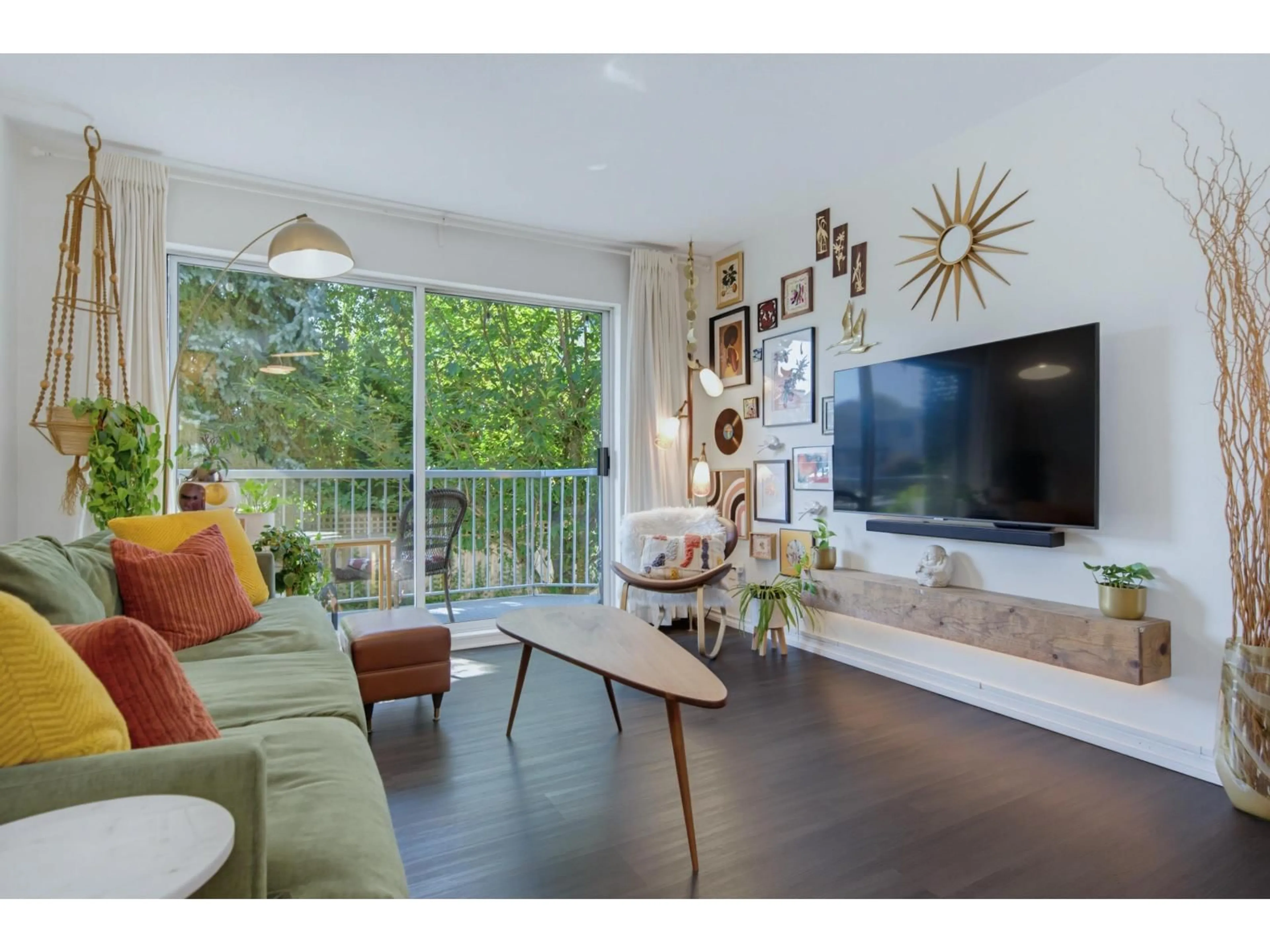 Living room with furniture, wood/laminate floor for 206 - 2750 FULLER STREET, Abbotsford British Columbia V2S3K1