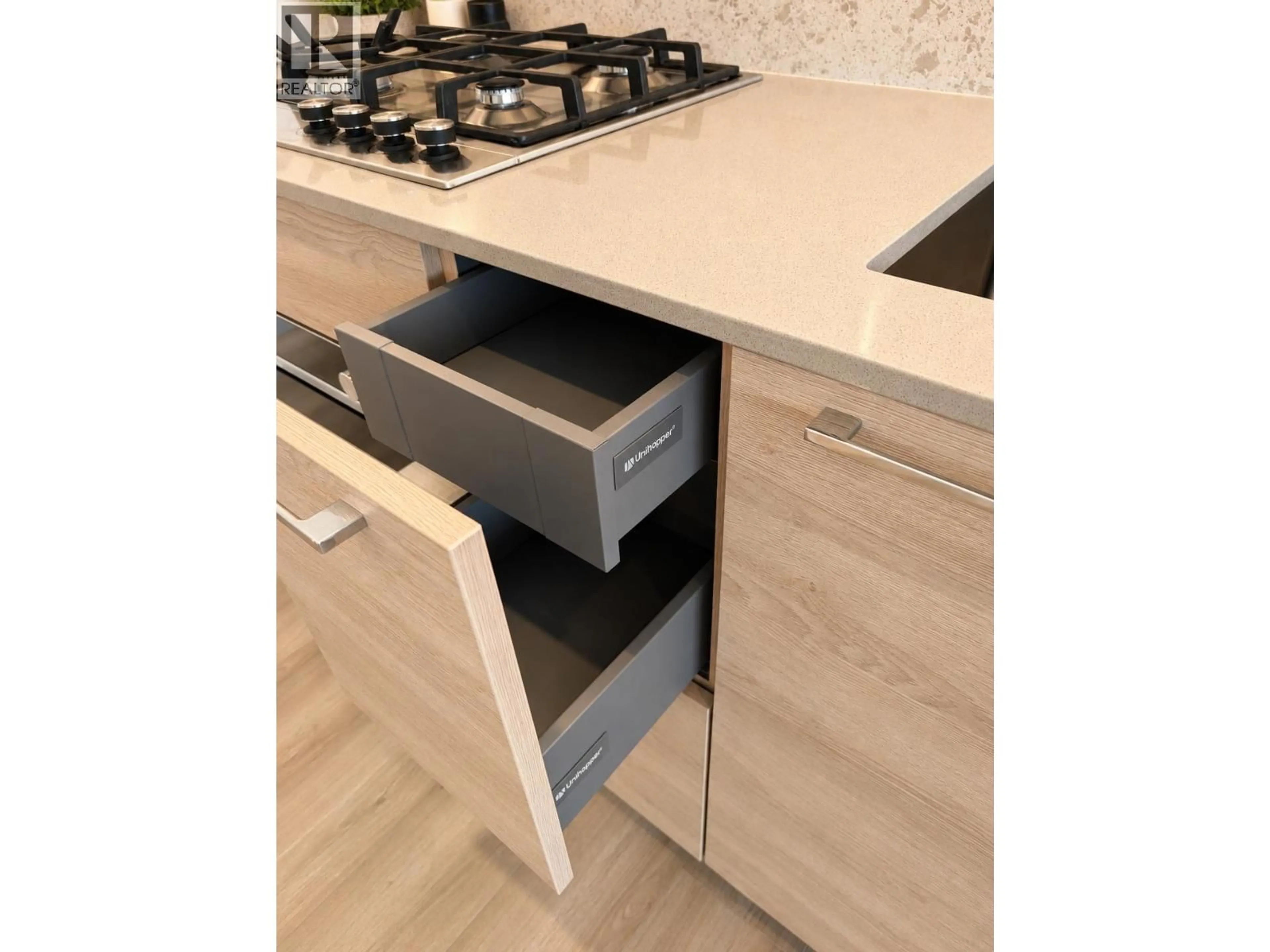 Contemporary kitchen, wood/laminate floor for 505 - 2381 BETA AVENUE, Burnaby British Columbia V5C0P7