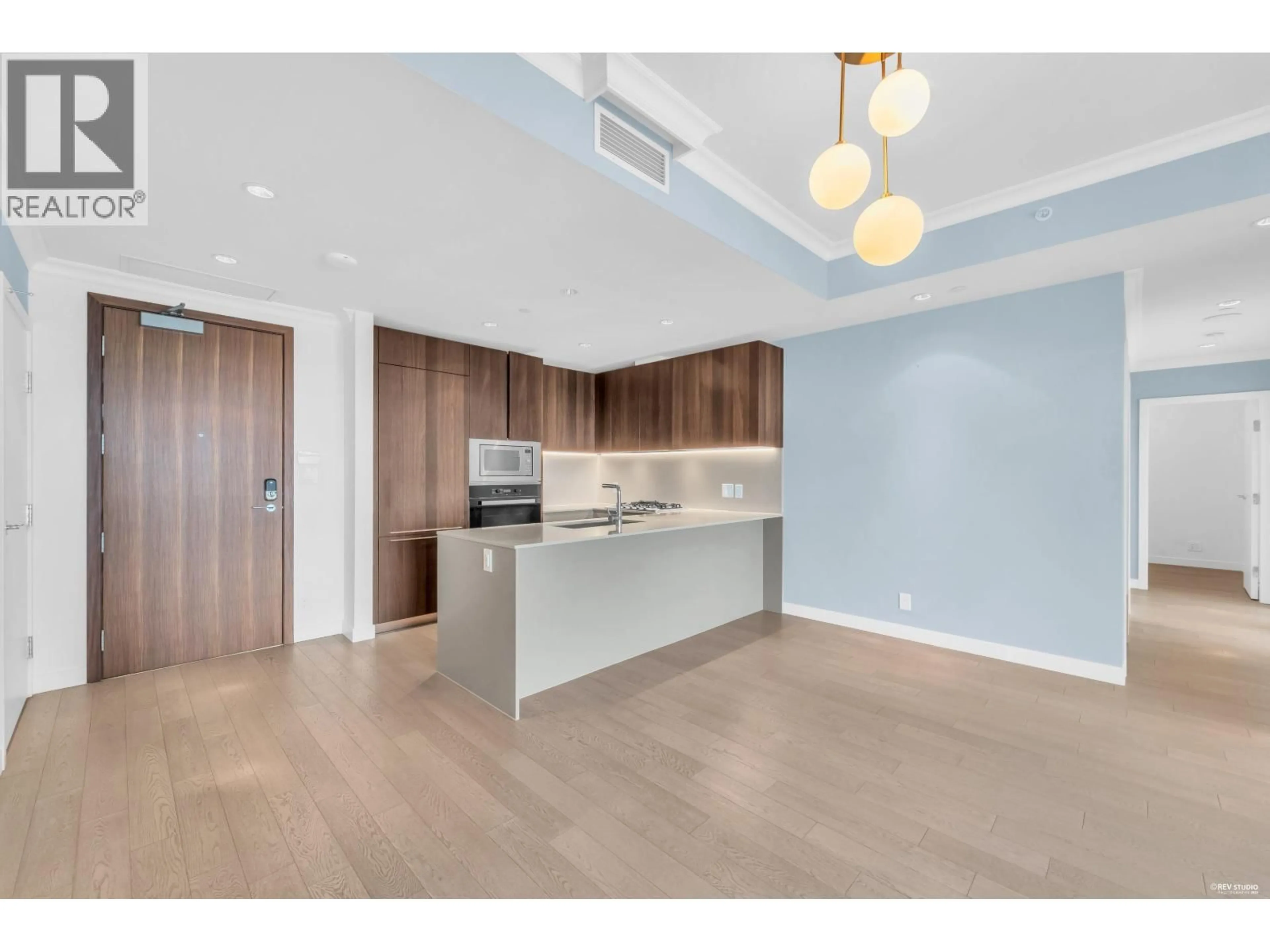 Open concept kitchen, wood/laminate floor for 709 - 6622 PEARSON WAY, Richmond British Columbia V7C0E4