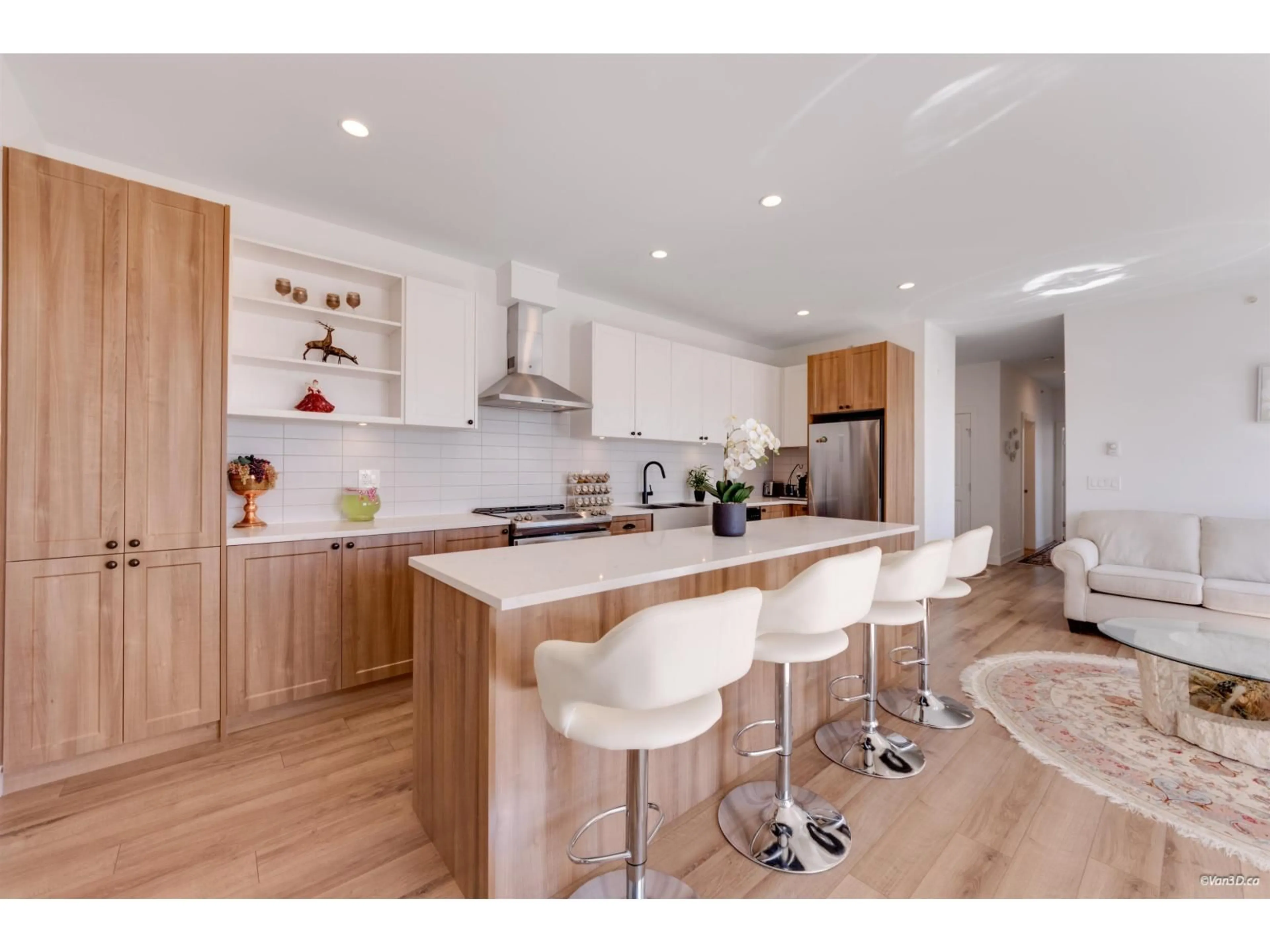 Open concept kitchen, wood/laminate floor for A502 - 20487 65 AVENUE, Langley British Columbia V2Y3K5