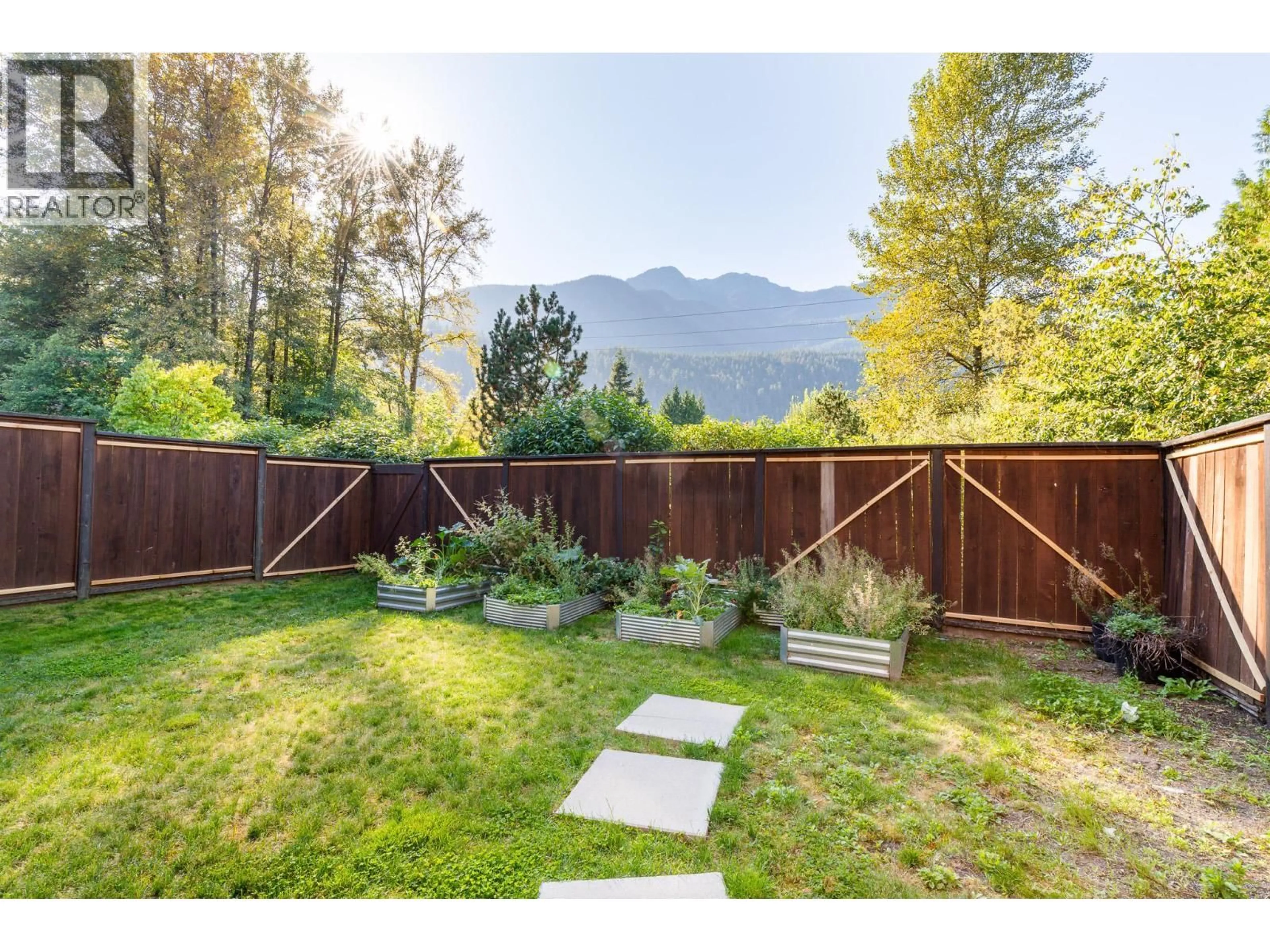 A pic from outside/outdoor area/front of a property/back of a property/a pic from drone, mountain view for 5 - 41488 BRENNAN ROAD, Squamish British Columbia V0N1H0