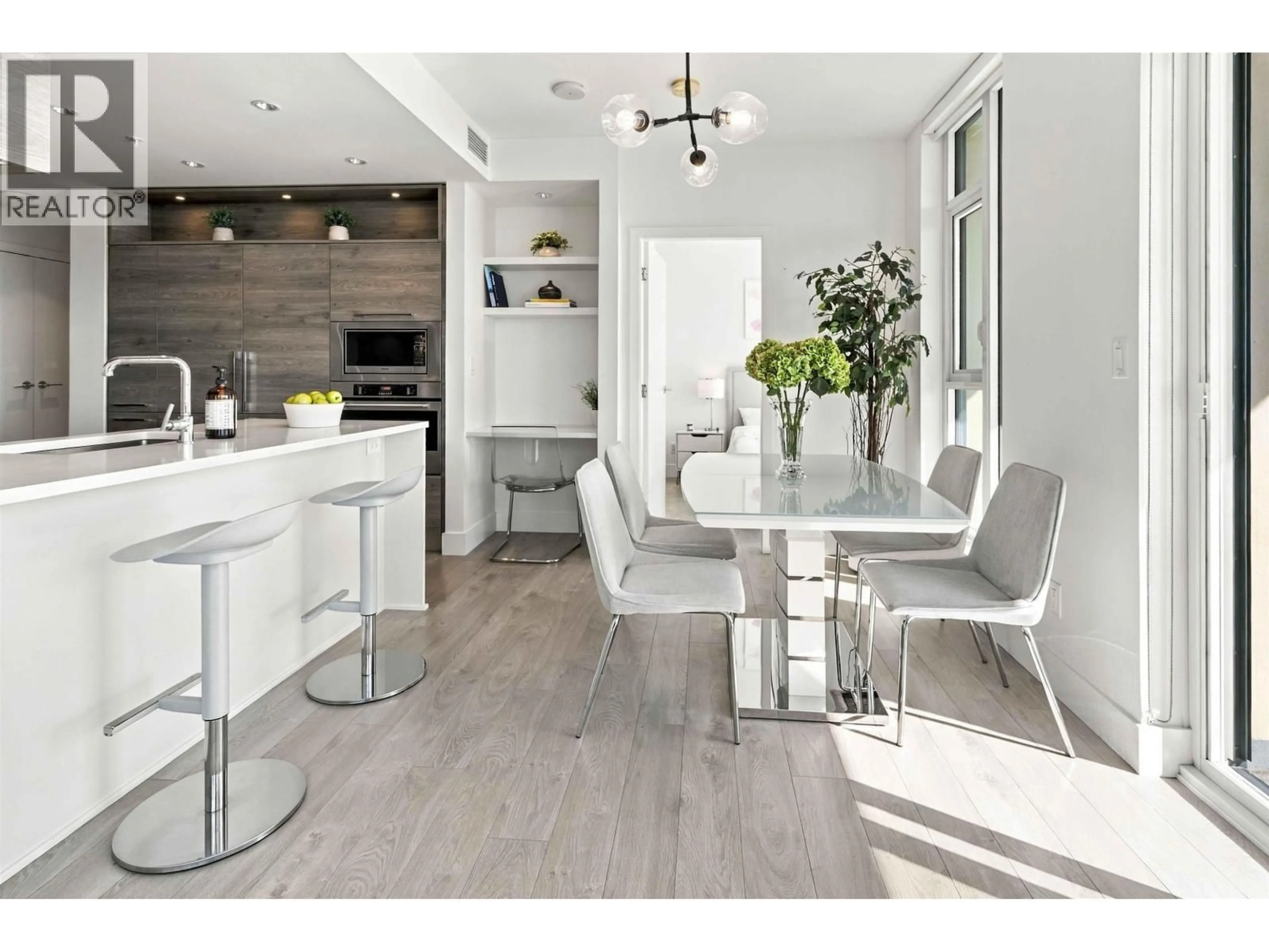 Contemporary kitchen, wood/laminate floor for 710 - 7388 KINGSWAY, Burnaby British Columbia V3N0G9