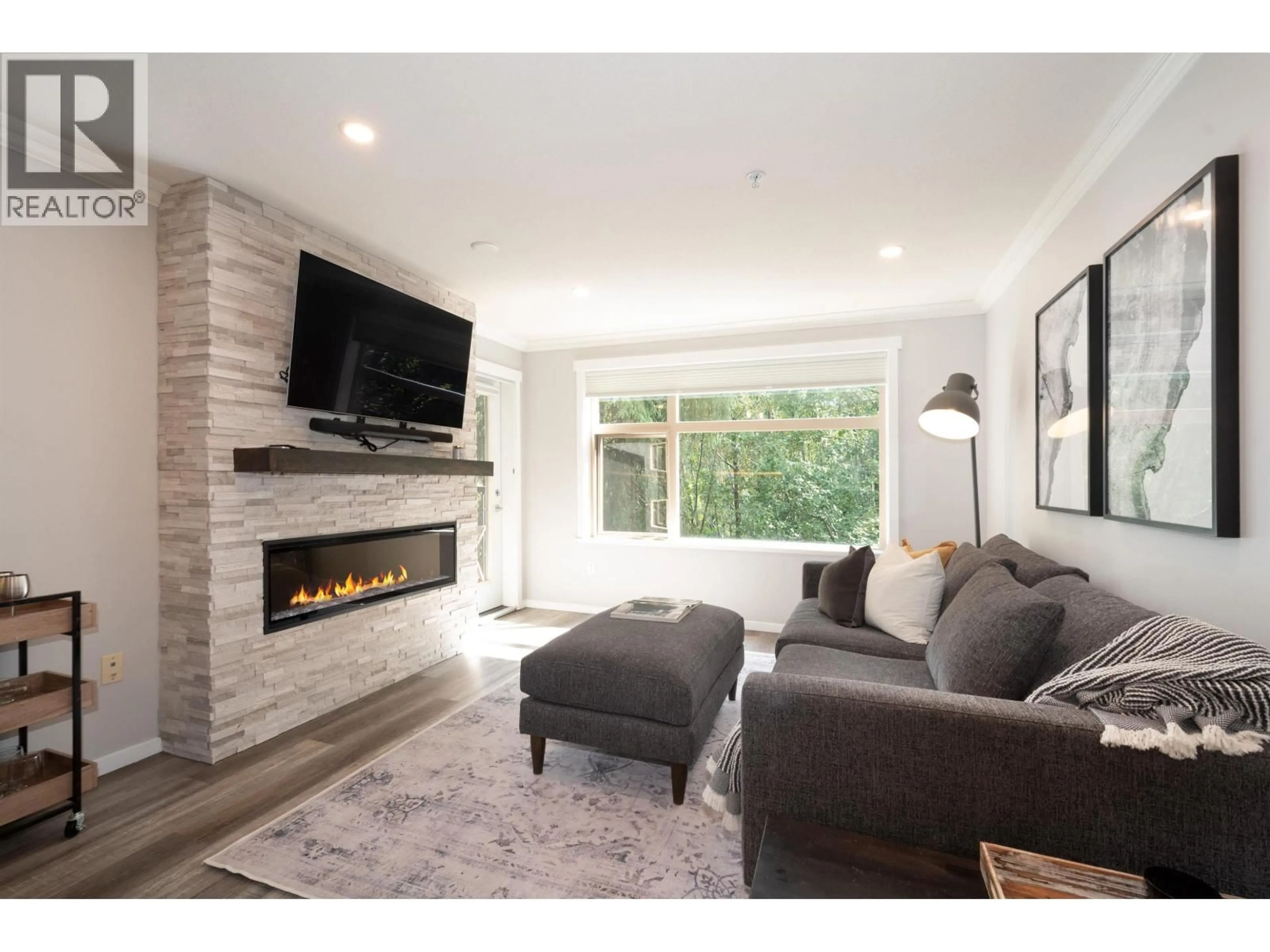 Living room with furniture, unknown for 204 - 300 KLAHANIE DRIVE, Port Moody British Columbia V3H5K9
