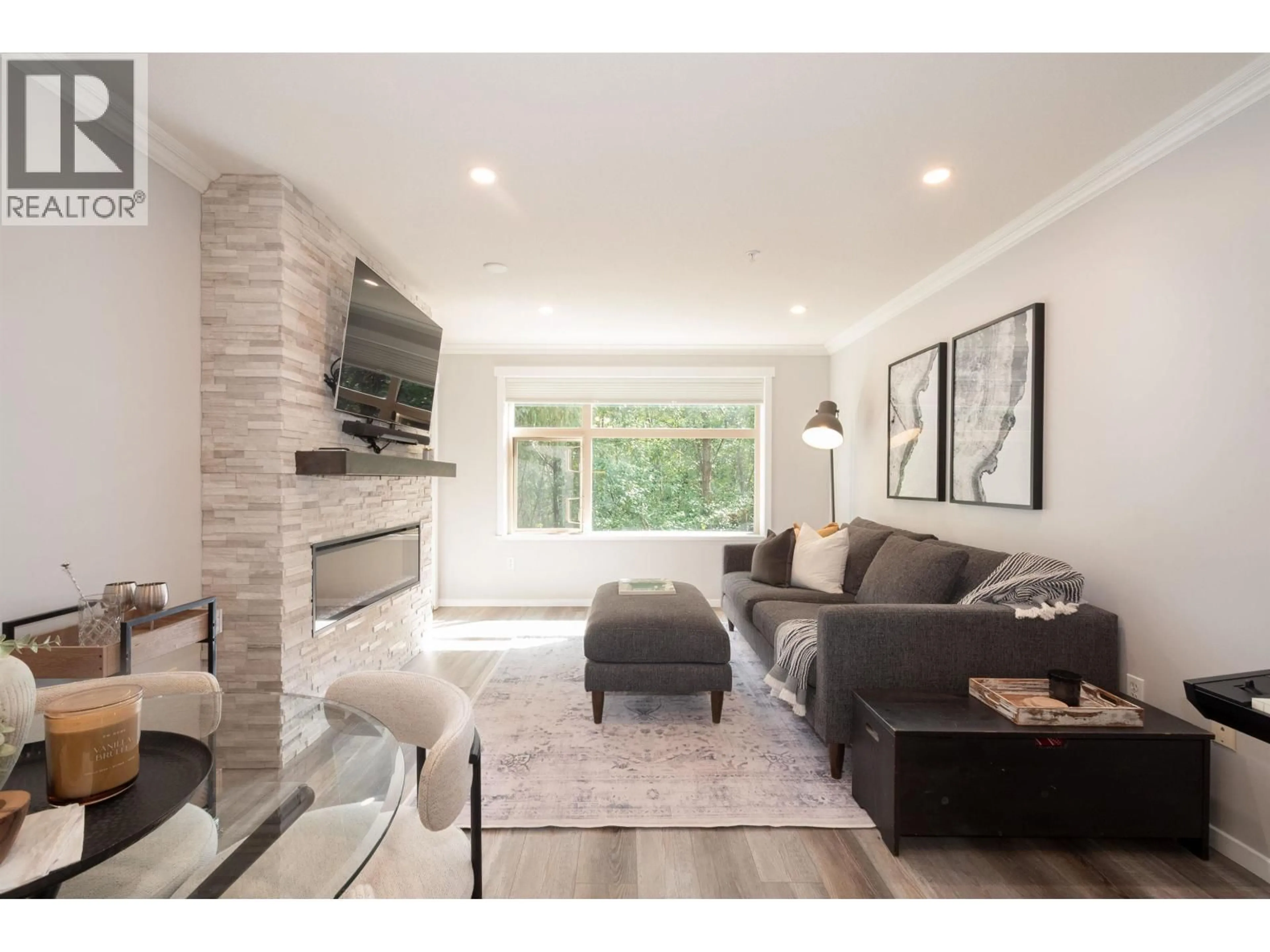 Living room with furniture, unknown for 204 - 300 KLAHANIE DRIVE, Port Moody British Columbia V3H5K9