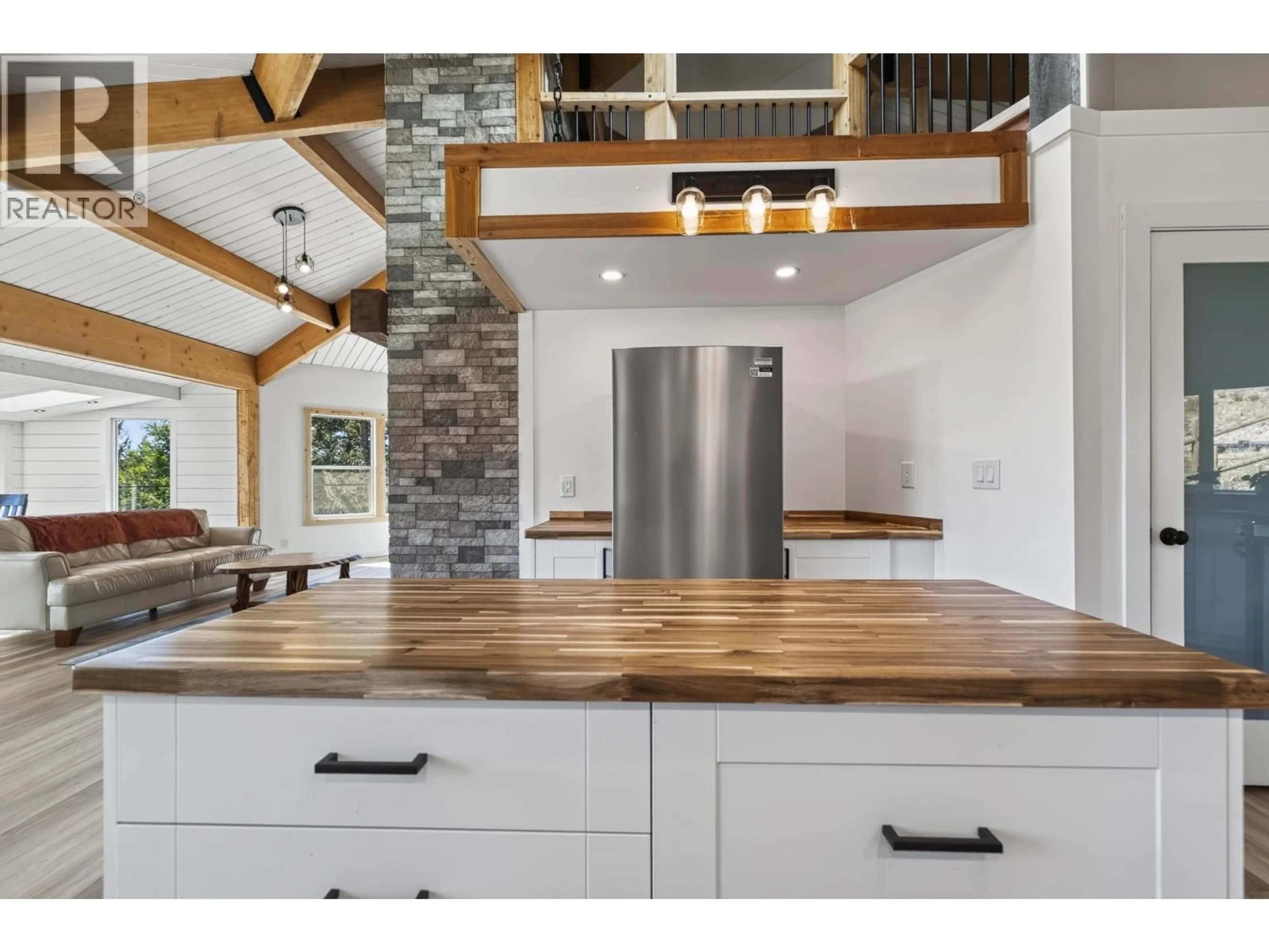Open concept kitchen, unknown for 6318 HIGHLAND CRESCENT, 100 Mile House British Columbia V0K2E3