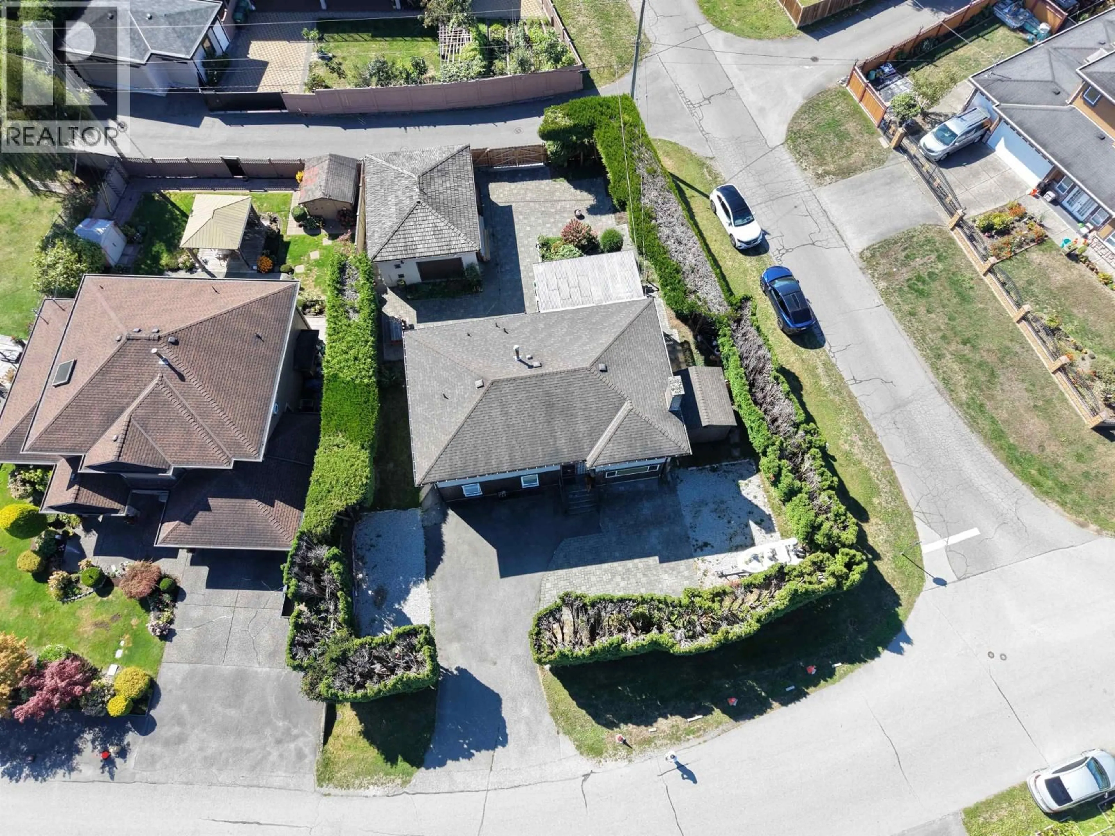 A pic from outside/outdoor area/front of a property/back of a property/a pic from drone, street for 10440 AINTREE CRESCENT, Richmond British Columbia V7A3T6