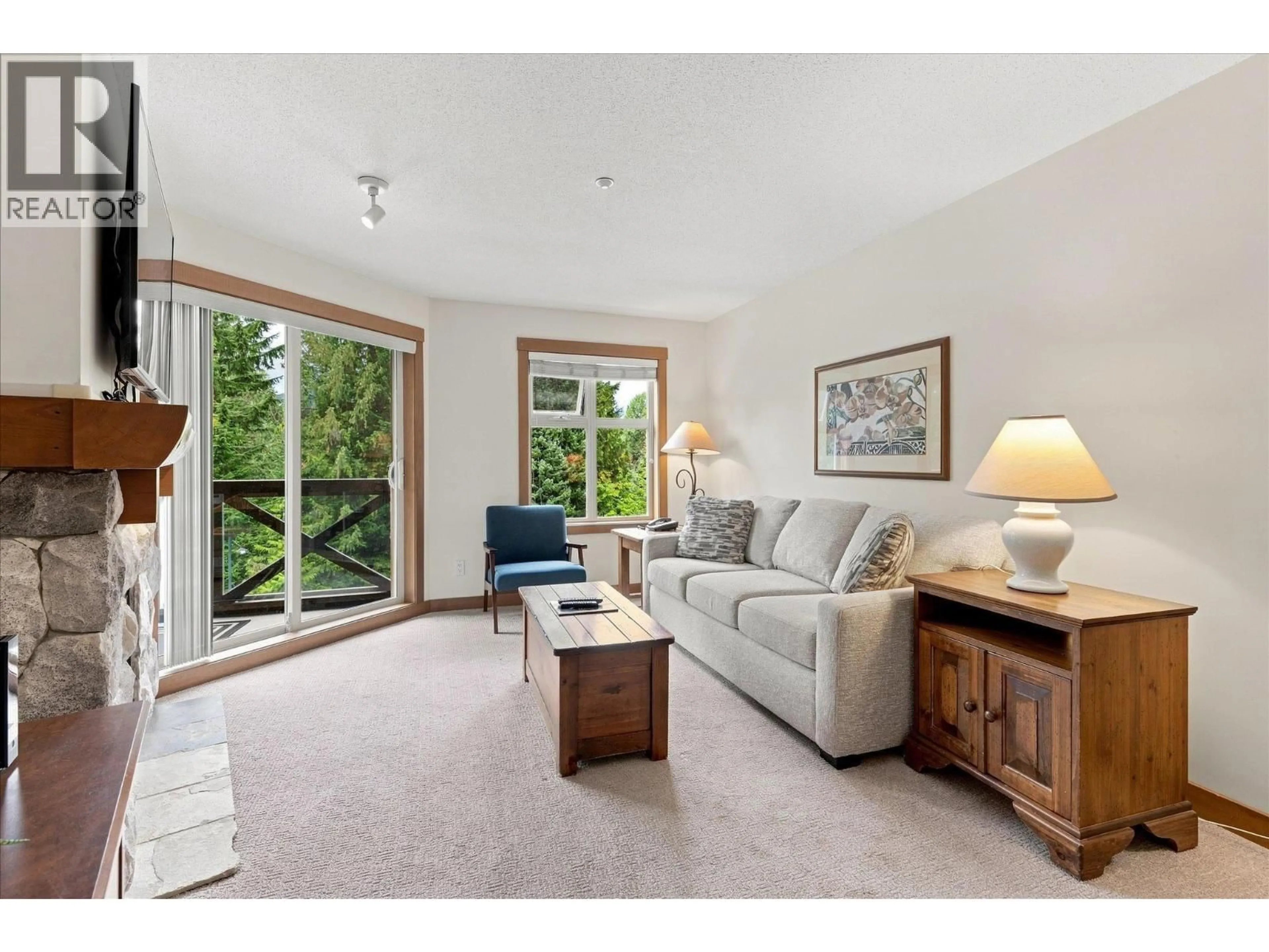 Living room with furniture, unknown for 311 - 4660 BLACKCOMB WAY, Whistler British Columbia V8E0X7