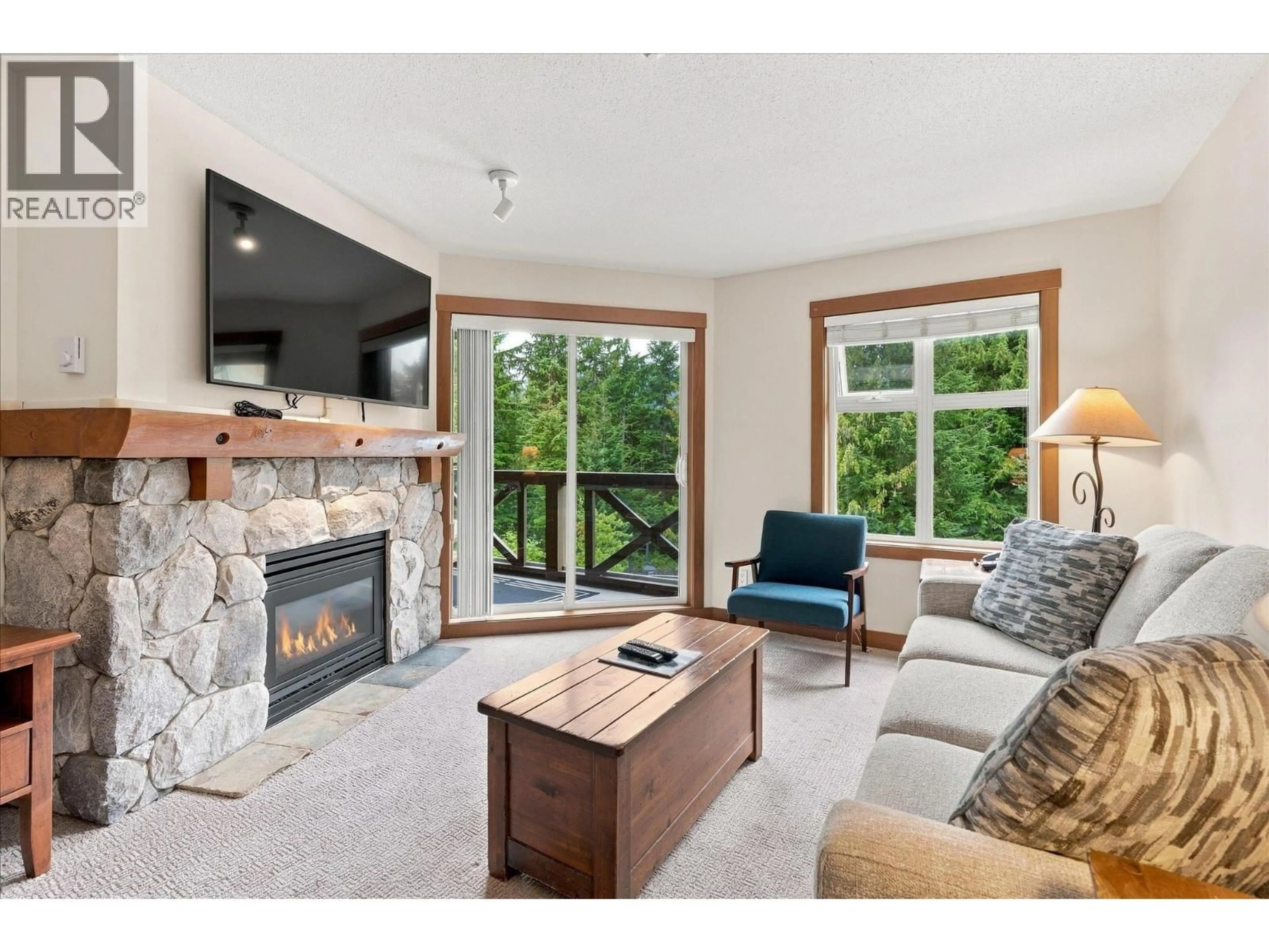 Living room with furniture, unknown for 311 - 4660 BLACKCOMB WAY, Whistler British Columbia V8E0X7