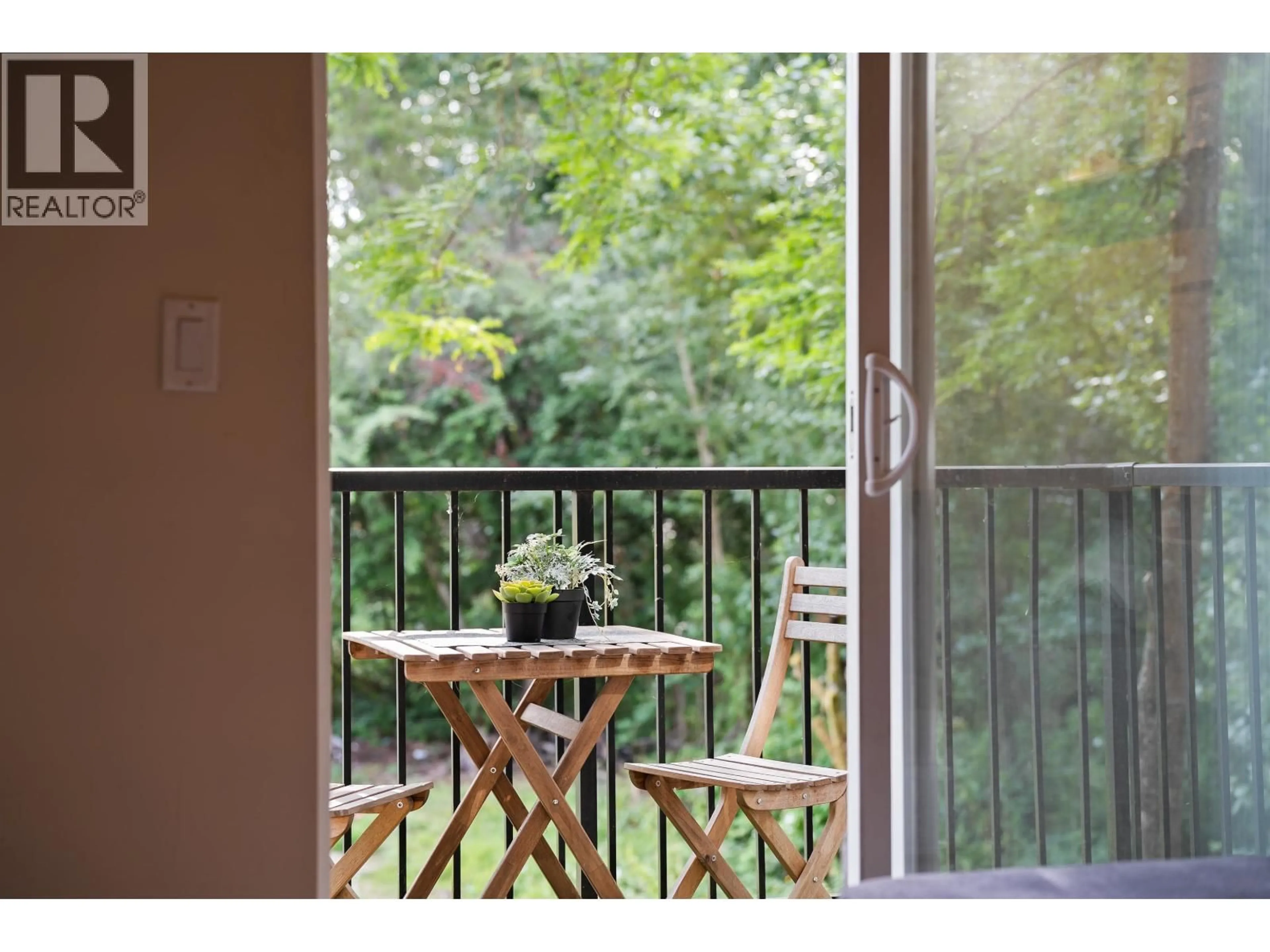 Balcony in the apartment, forest/trees view for 214 - 5211 IRMIN STREET, Burnaby British Columbia V5J0C9