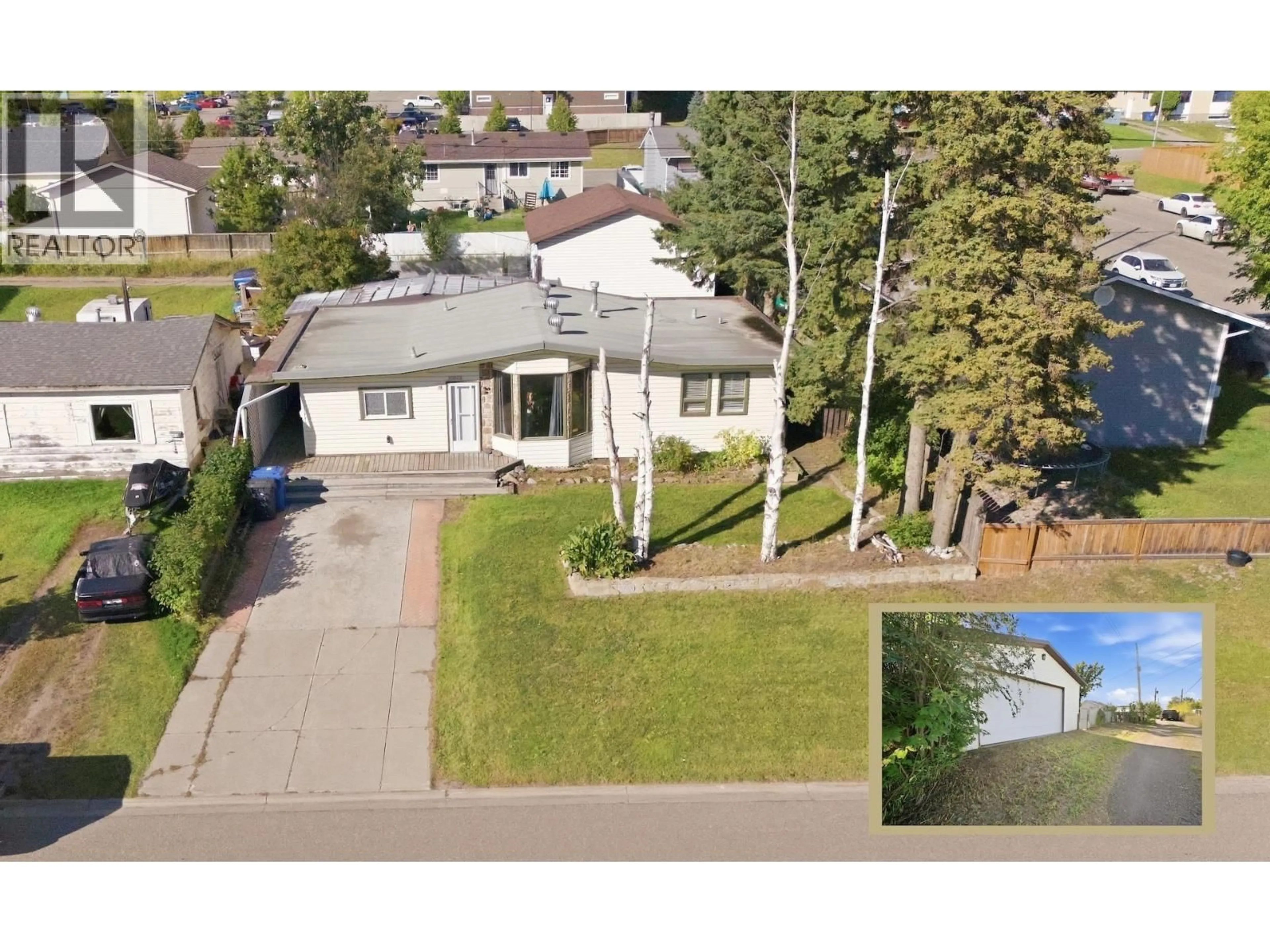 A pic from outside/outdoor area/front of a property/back of a property/a pic from drone, street for 10808 101 AVENUE, Fort St. John British Columbia V1J2C2