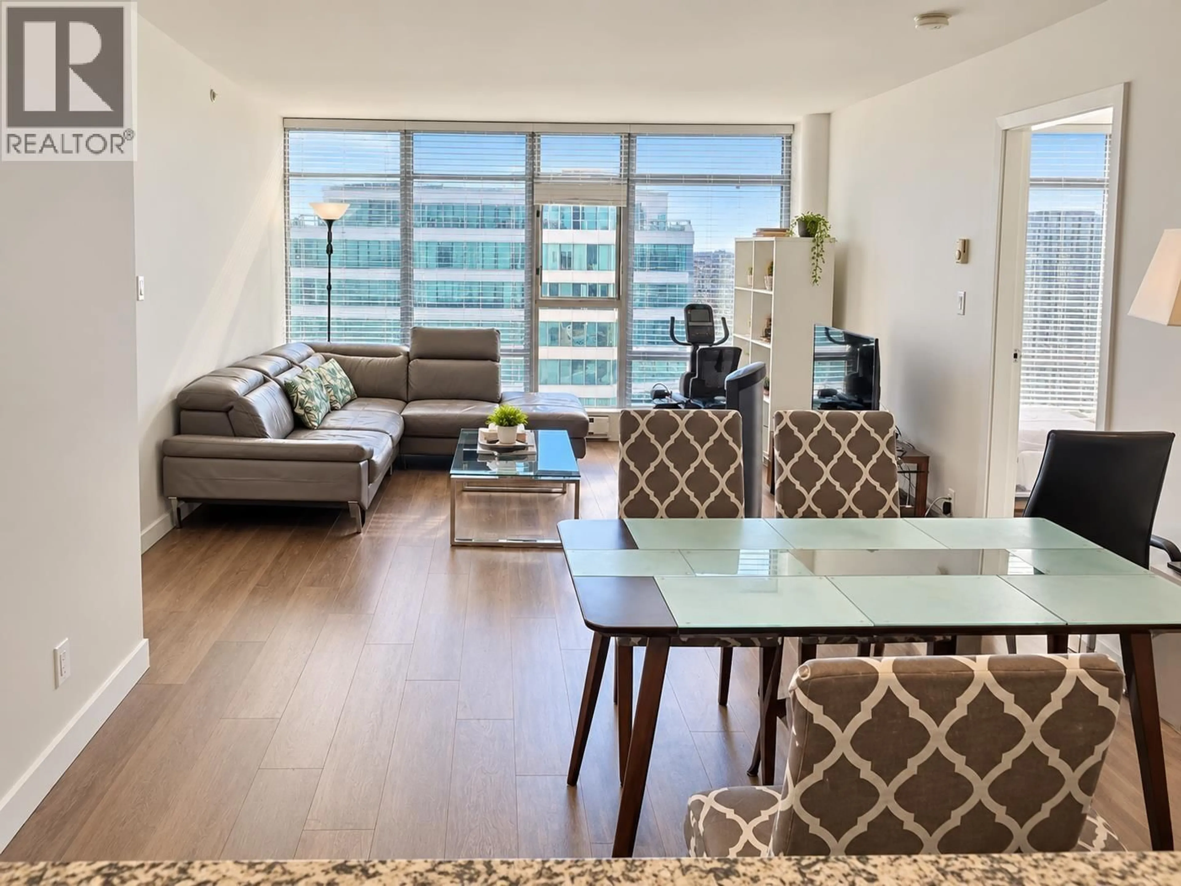 Living room with furniture, wood/laminate floor for 1608 - 7888 SABA ROAD, Richmond British Columbia V6Y0A2