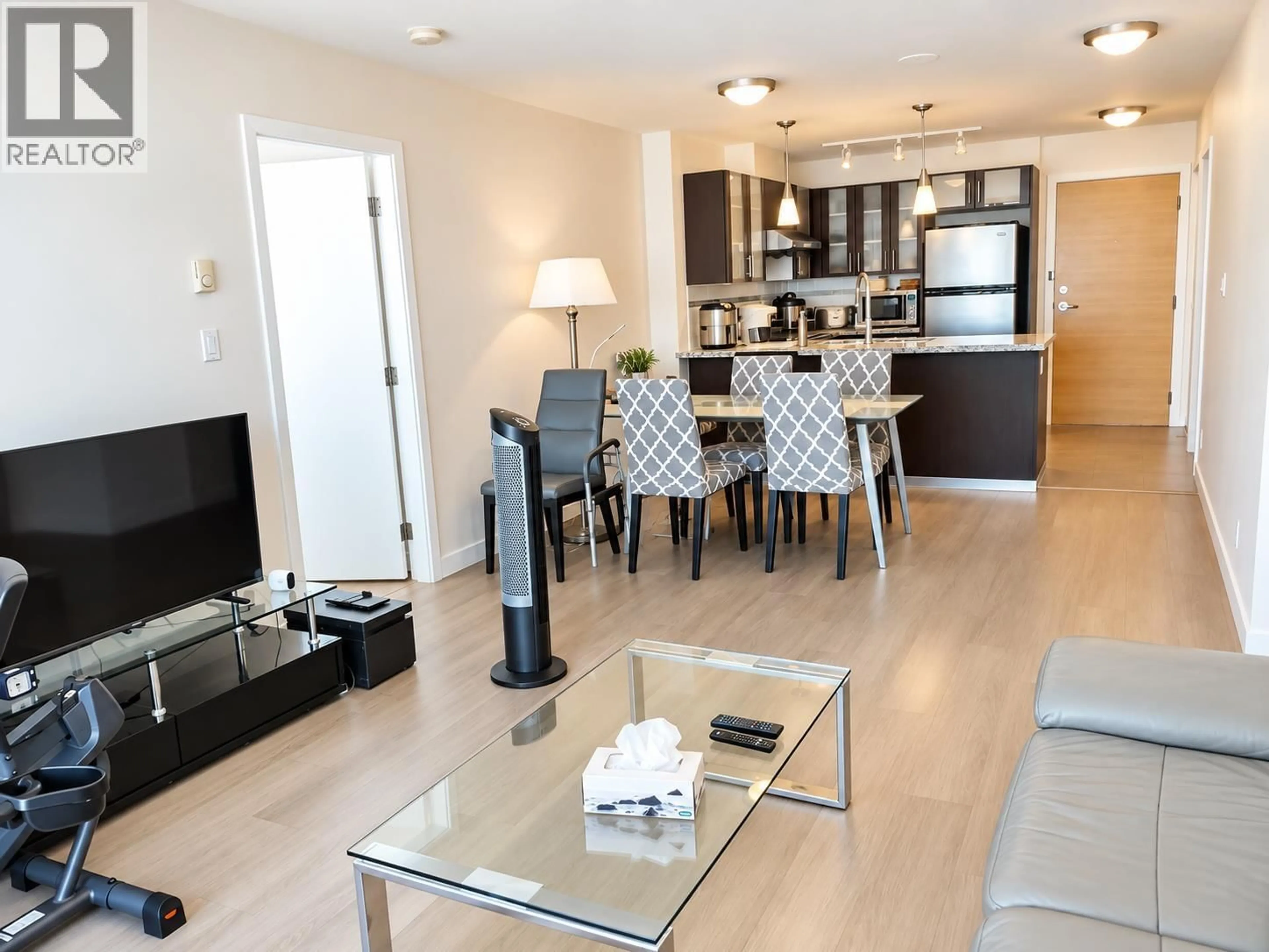 Living room with furniture, wood/laminate floor for 1608 - 7888 SABA ROAD, Richmond British Columbia V6Y0A2