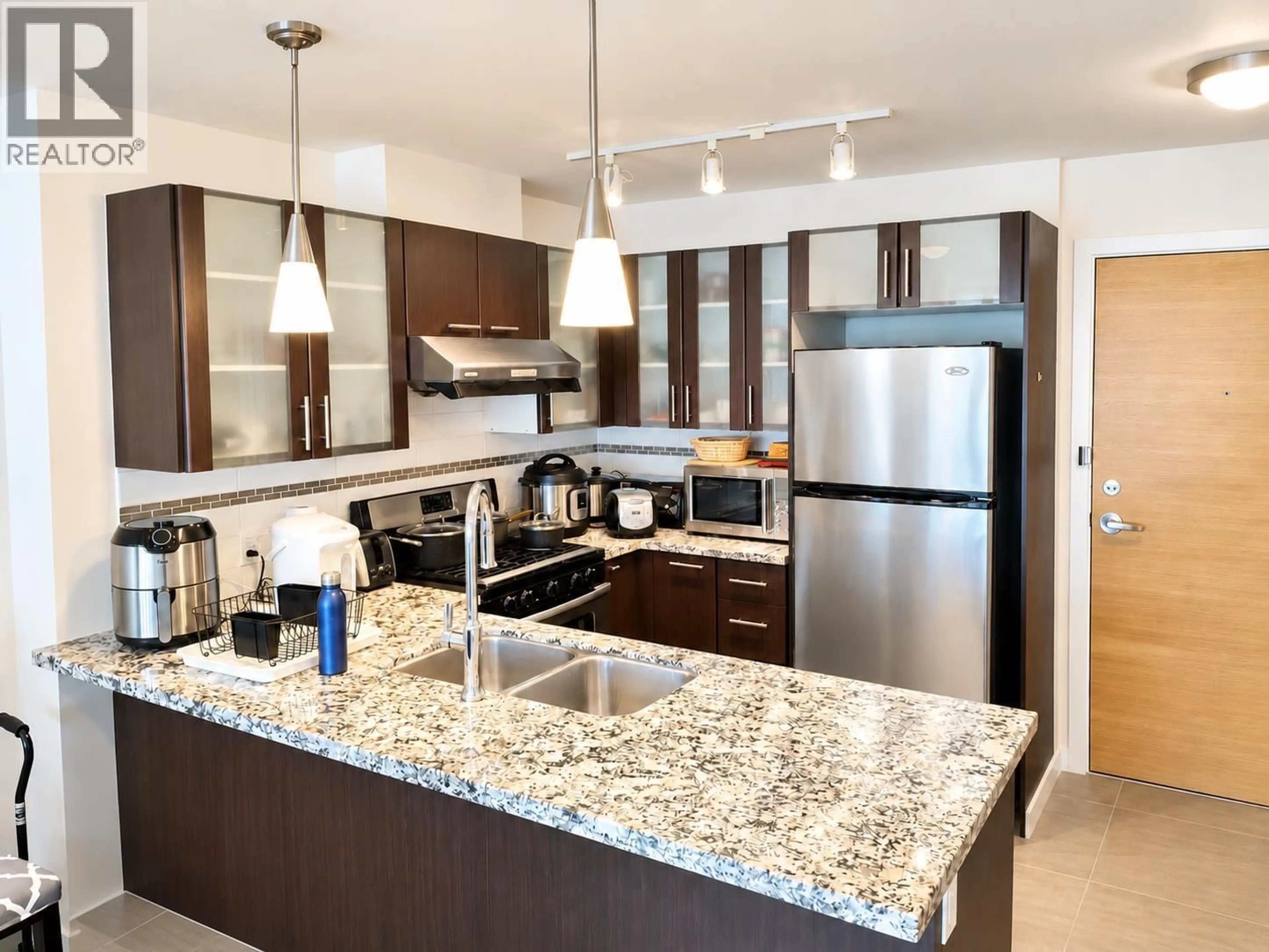 Open concept kitchen, ceramic/tile floor for 1608 - 7888 SABA ROAD, Richmond British Columbia V6Y0A2