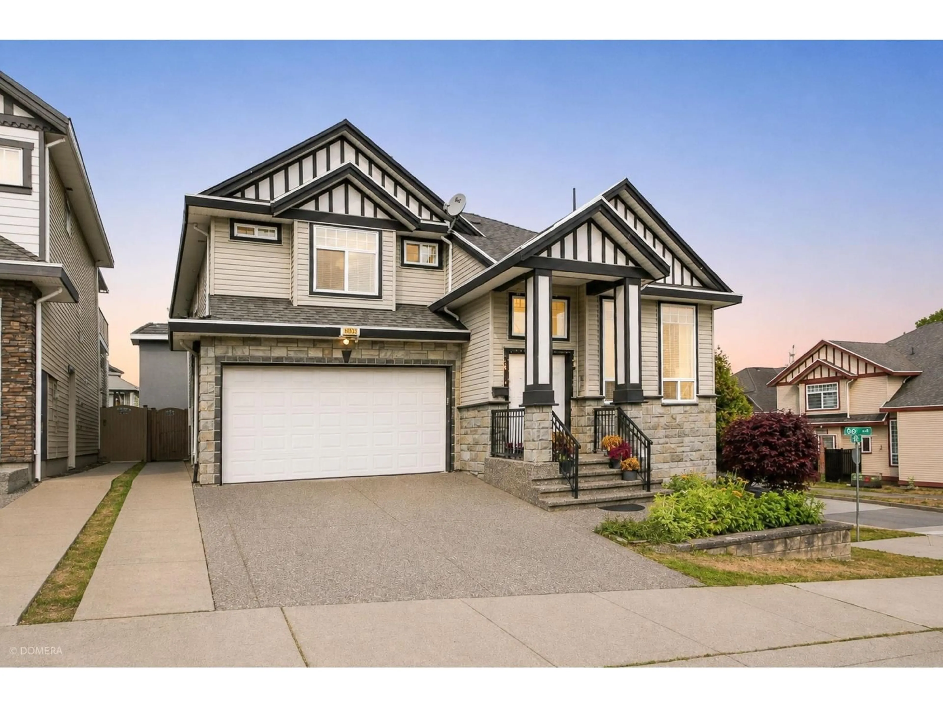 Home with vinyl exterior material, street for 6191 146 STREET, Surrey British Columbia V3S3A1