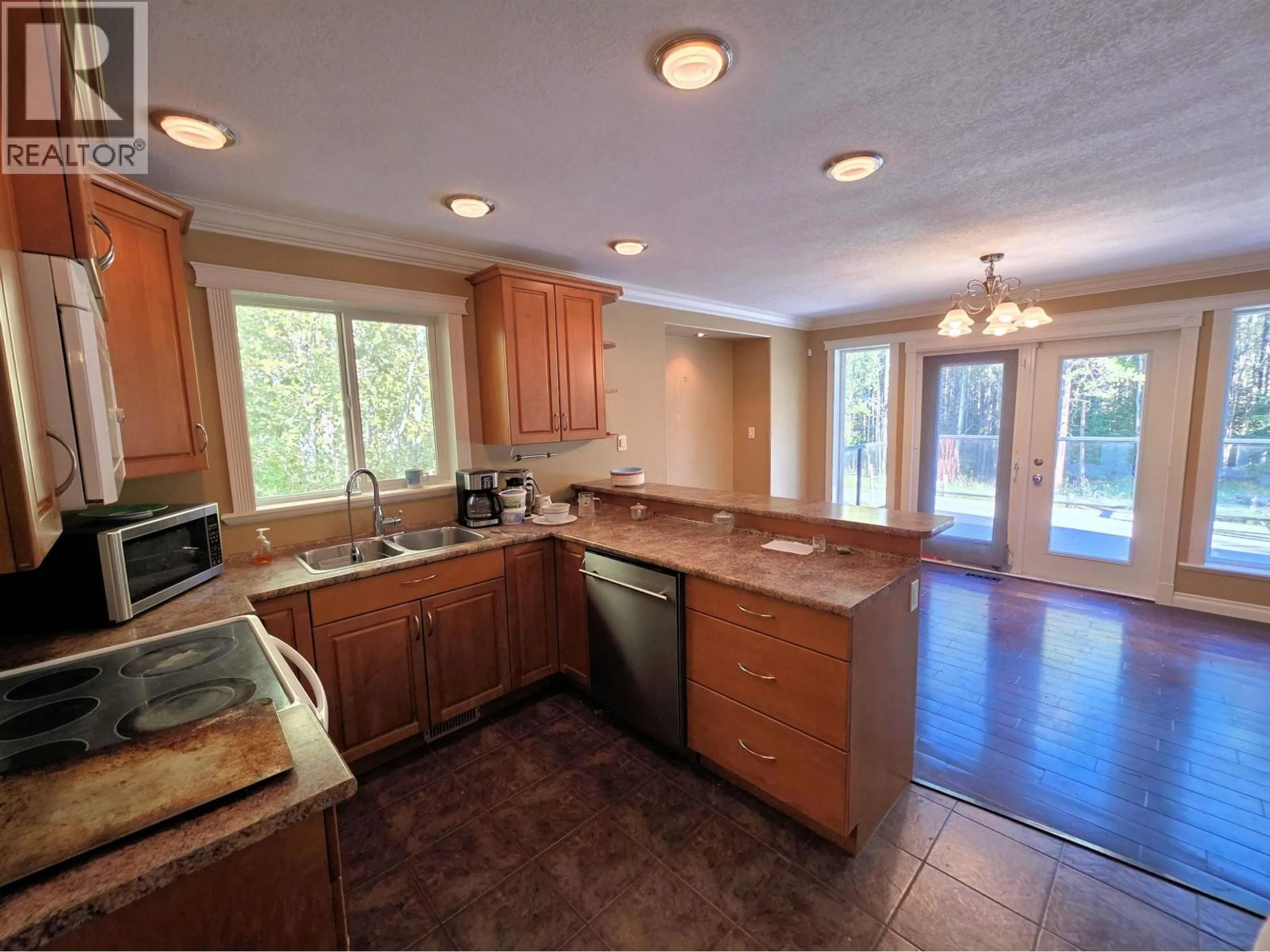 Open concept kitchen, unknown for 9122 REYNOLDS ROAD, Prince George British Columbia V2N6N5