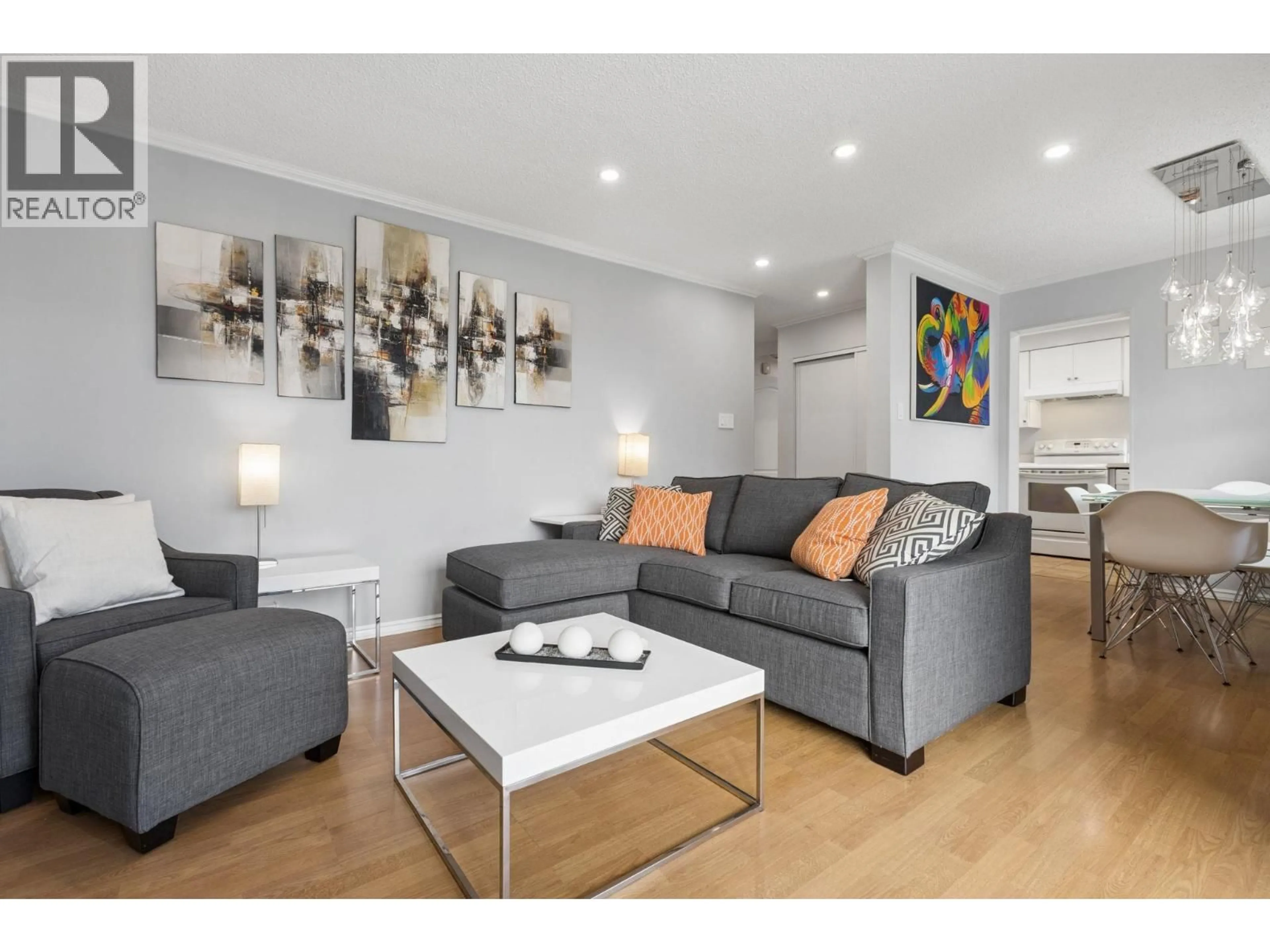 Living room with furniture, wood/laminate floor for 206 - 2120 2ND AVENUE, Vancouver British Columbia V6K1H6