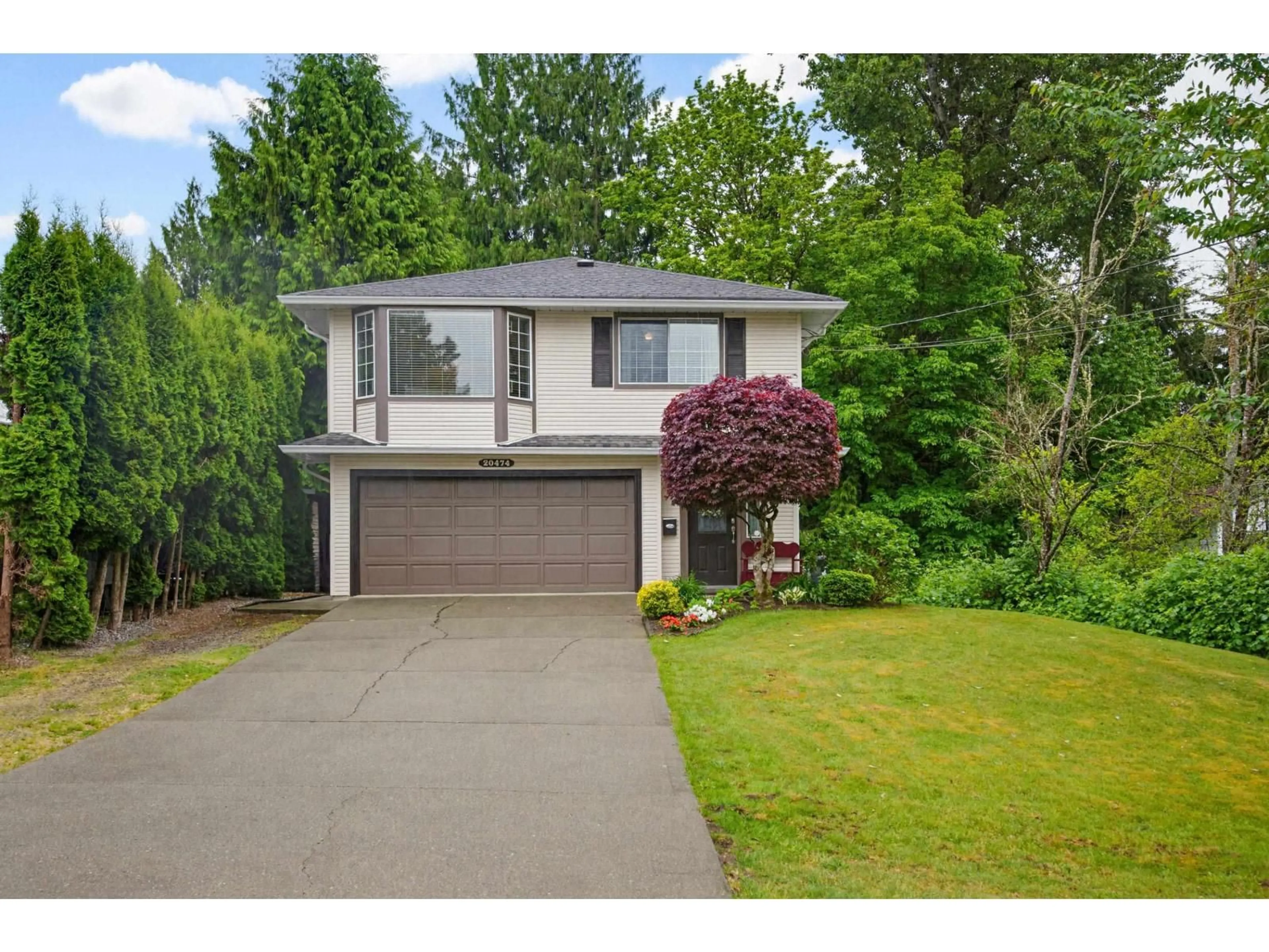 Home with vinyl exterior material, street for 20474 43A AVENUE, Langley British Columbia V3A3C8